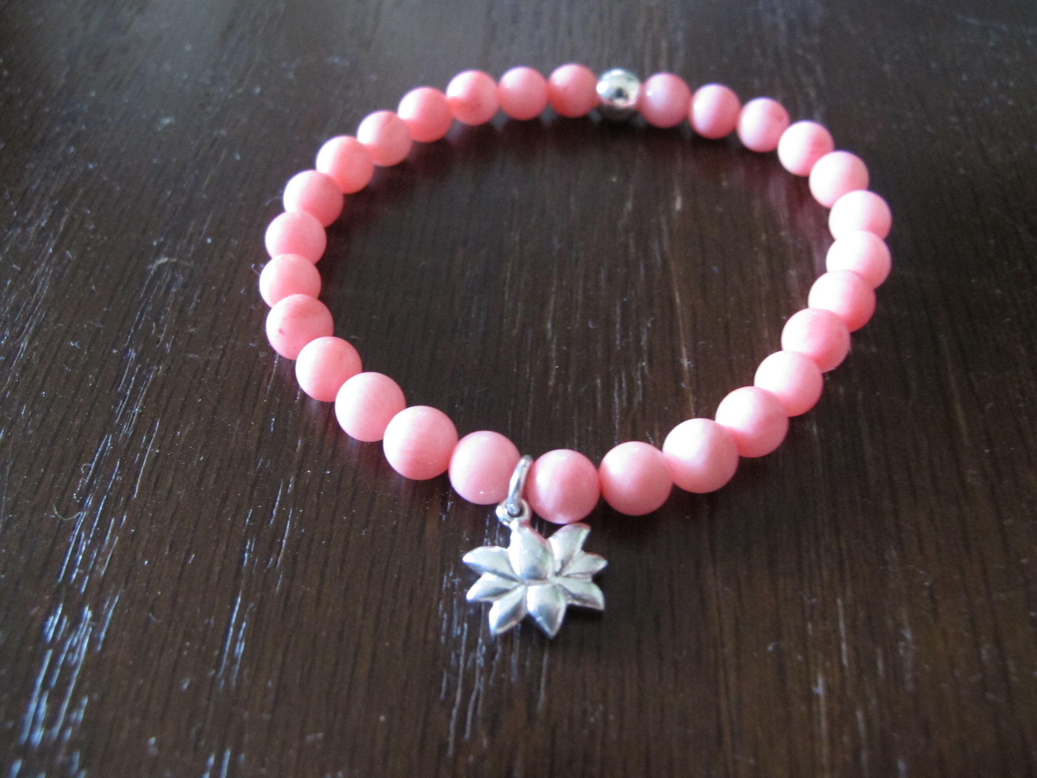 Bright and colourful peach coral with a 925 Sterling silver lotus flower charm (sold)
