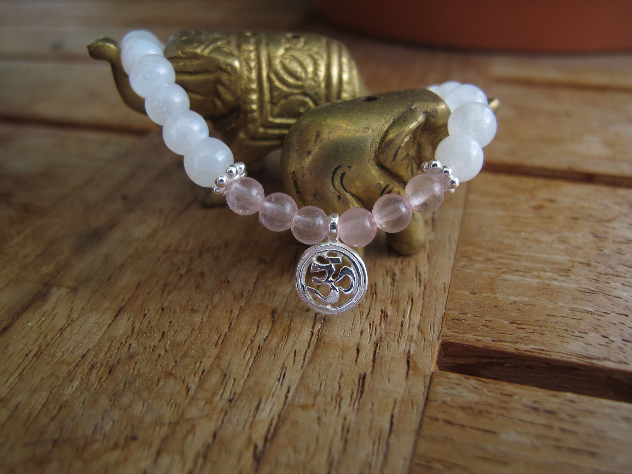 Moonstone with the lovely rose quartz, enhanced with a 925 Sterling silver "OM" charm and elements (sold)