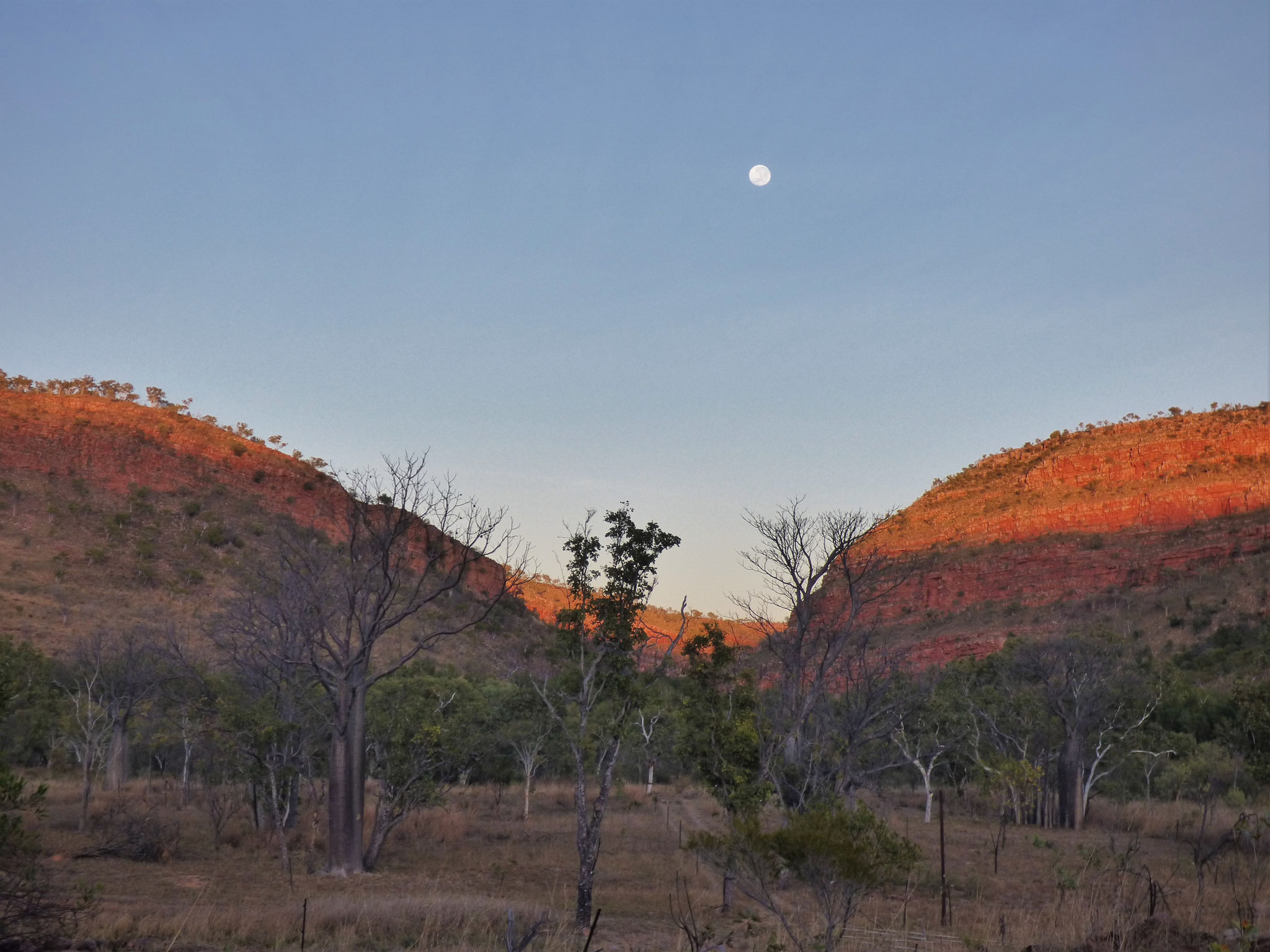 A winter’s dawn: sunshine touches the range after a full moon 