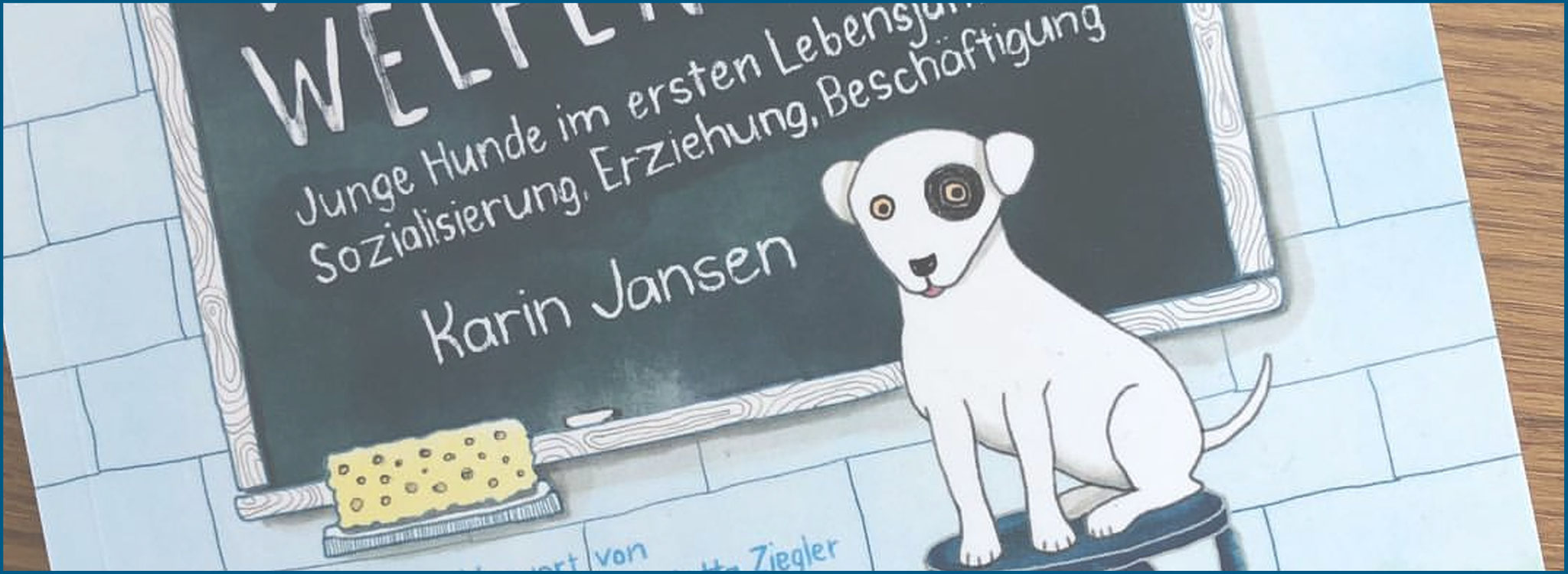 Das Buch "Die Welpen-Fiebel" von Karin Jansen mit einem Vorwort von Frau Dr. Jutta Ziegler und Illustrationen von Frau Käthe Schomburg