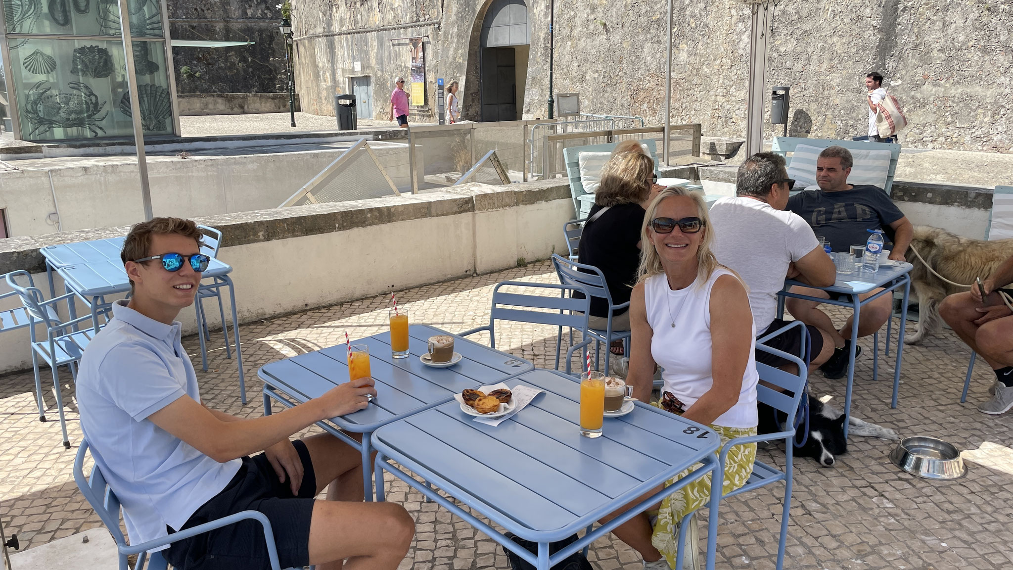 Coffee, orange juice and pastel de nata