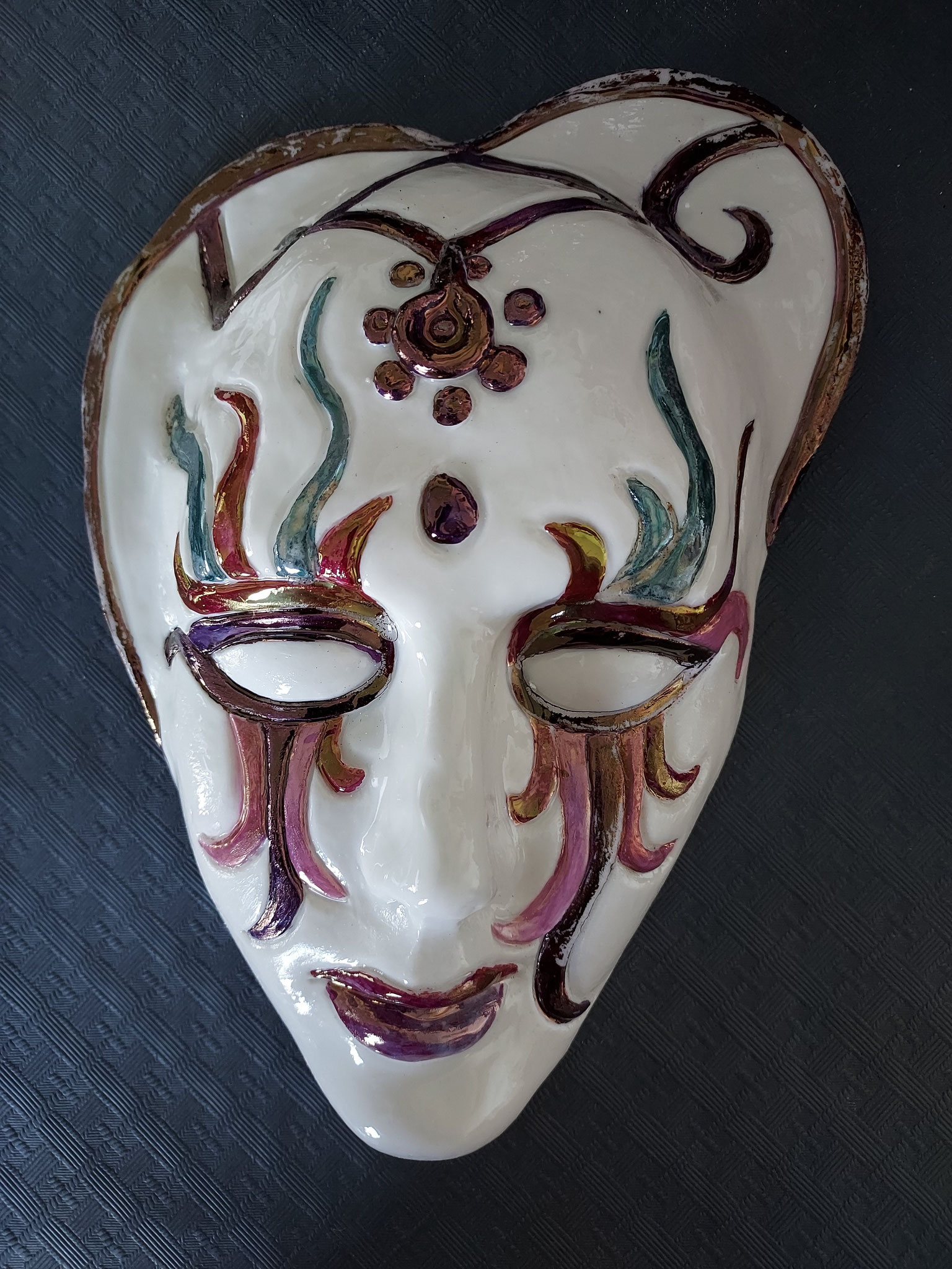 Masque porcelaine avec lustres 90 euros