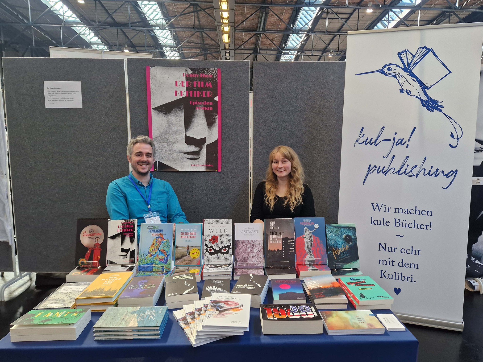 Buchmesse "BuchBerlin": Lektor, Stephan Herbst, vom Verlag Kul-ja! publishing & Autorin Malina Bura