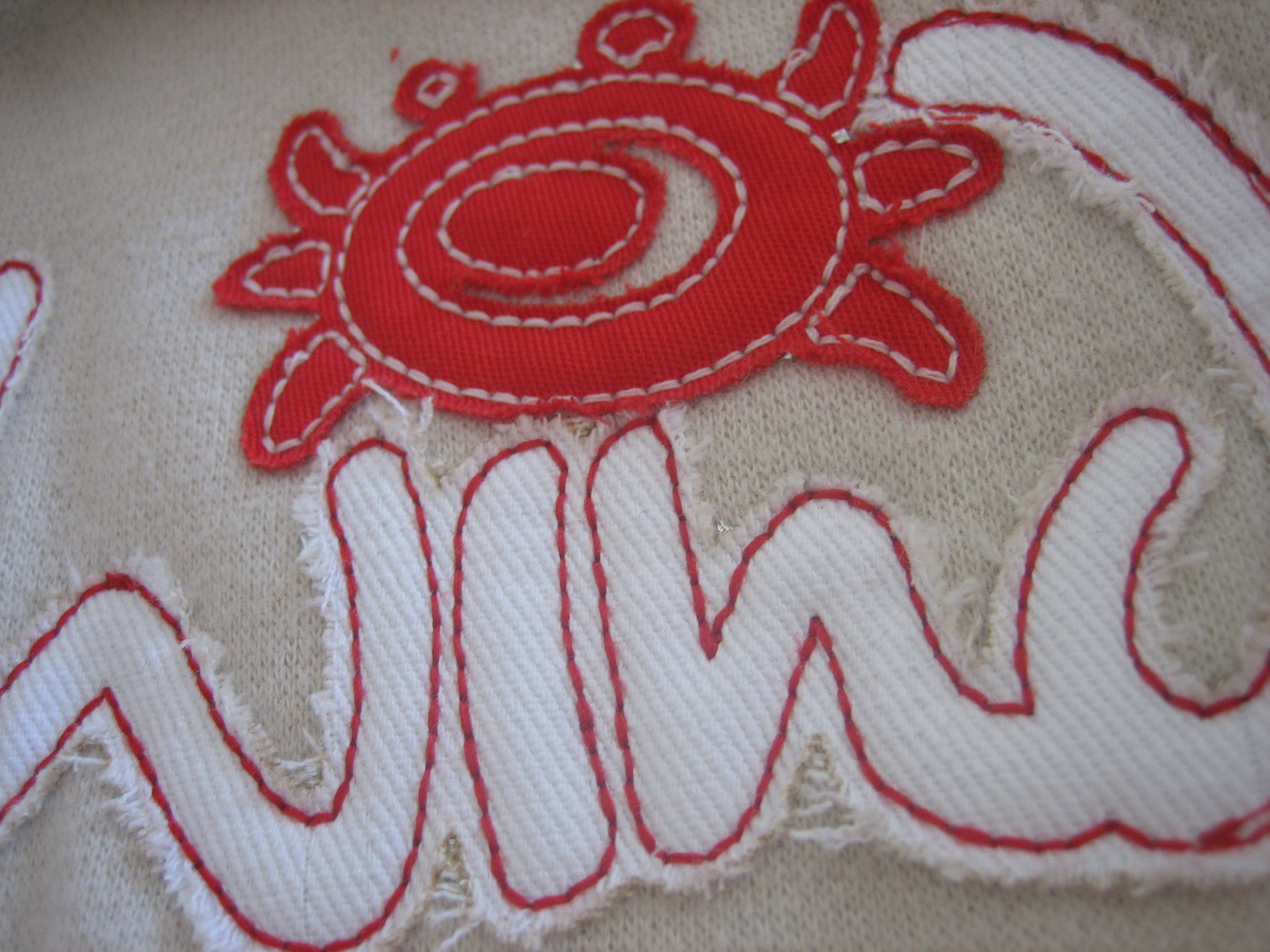 applicazione in twill doppio colore