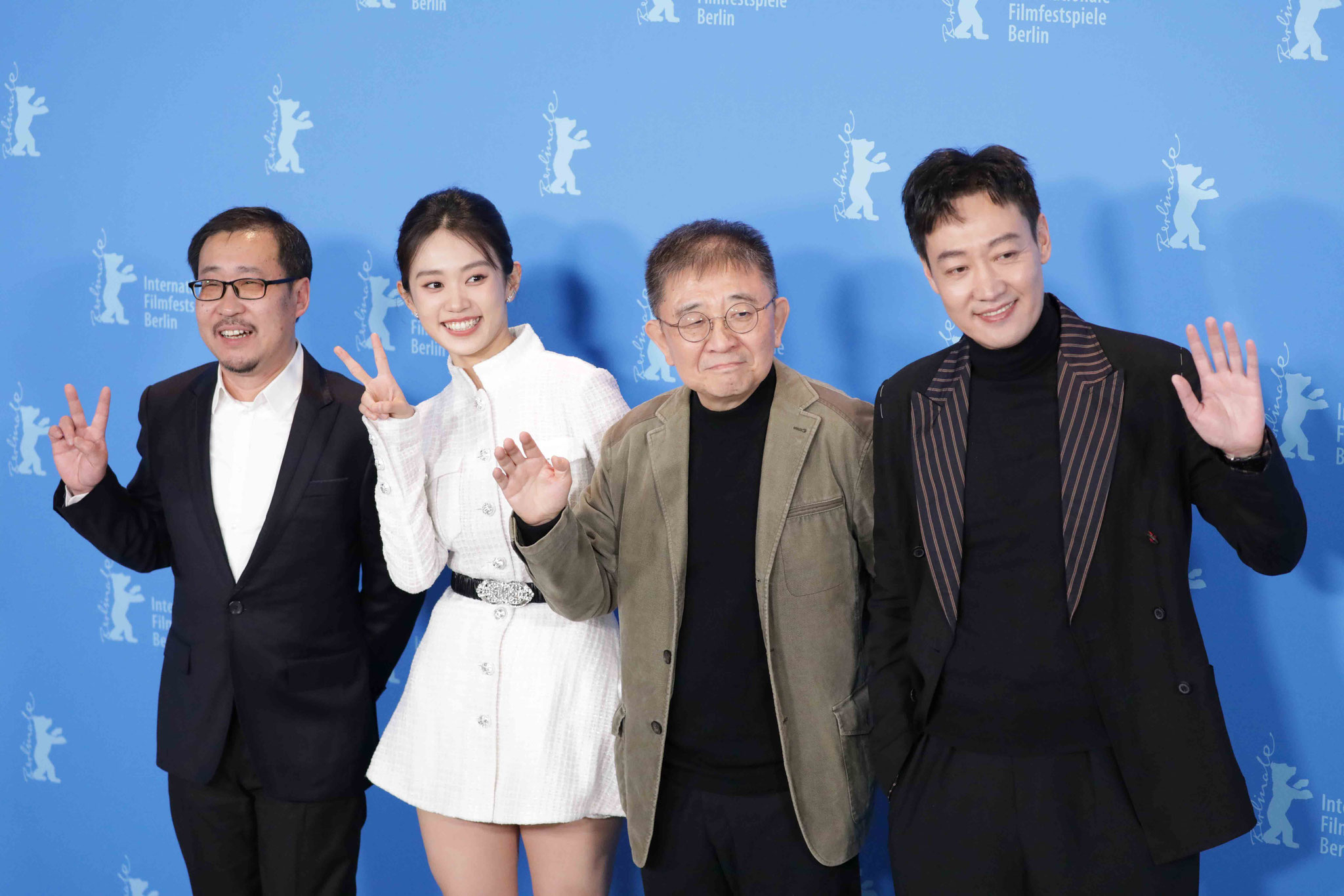 Wang Hongwei, Huang Yao, director Zhang Lu and Xin Baiqing during the photo call for the film "Bai Ta Zhi Guang".