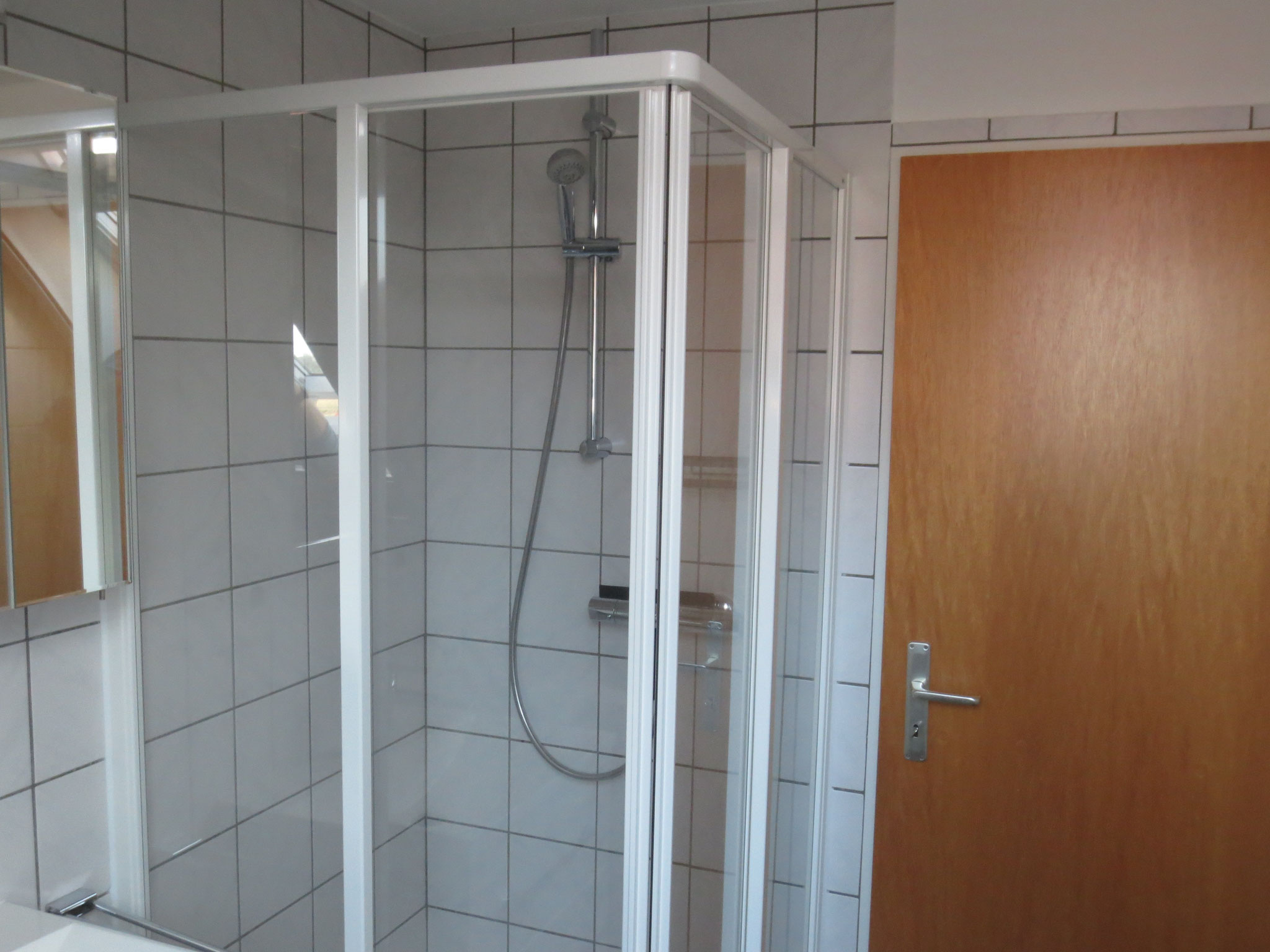 Dusche mit Glastüren