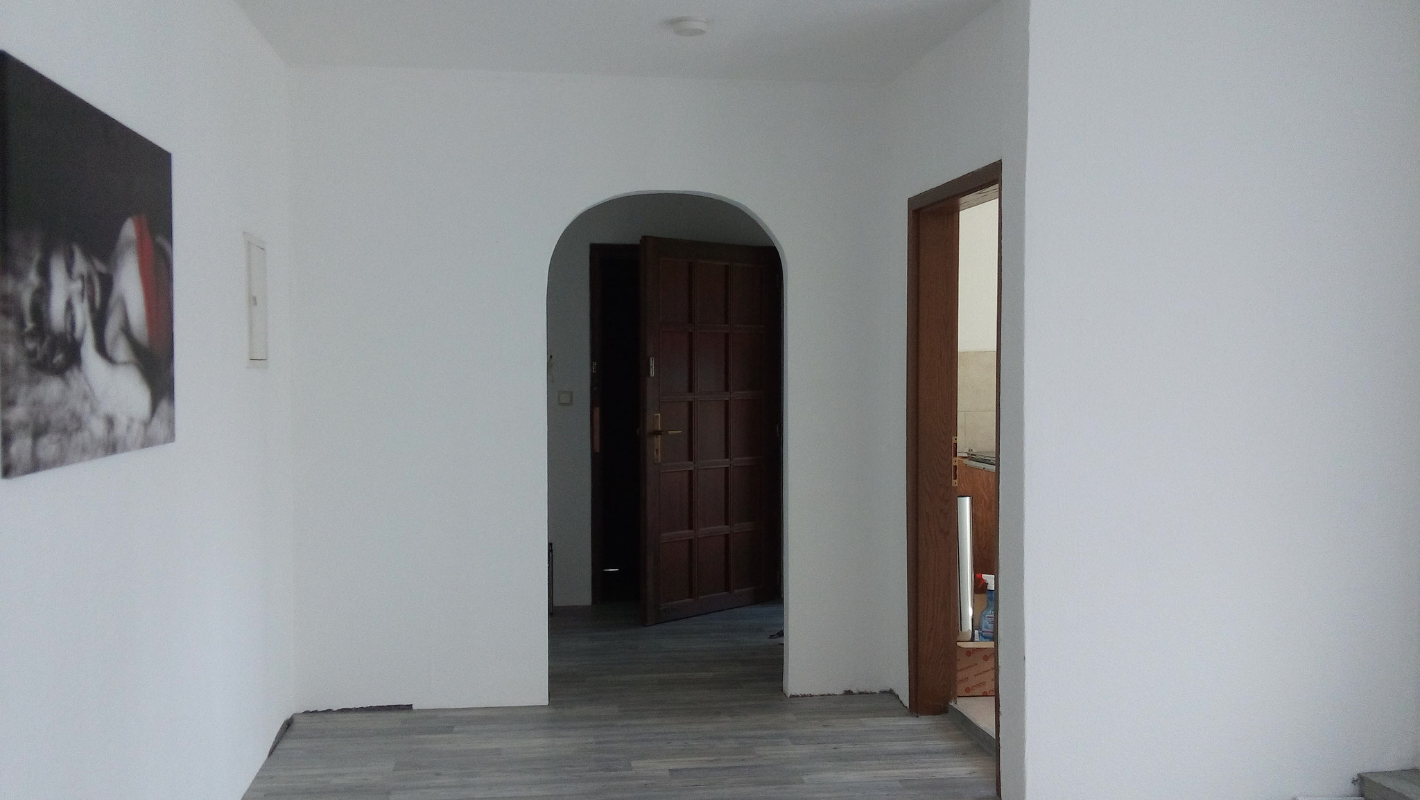 Wohnzimmer und Eingangsbereich