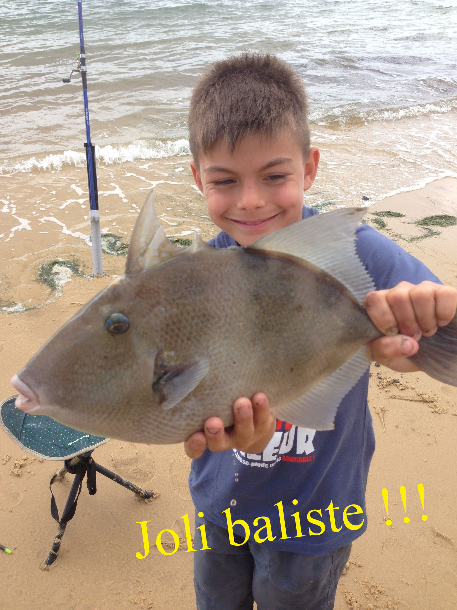 enfant pêche en mer le baliste