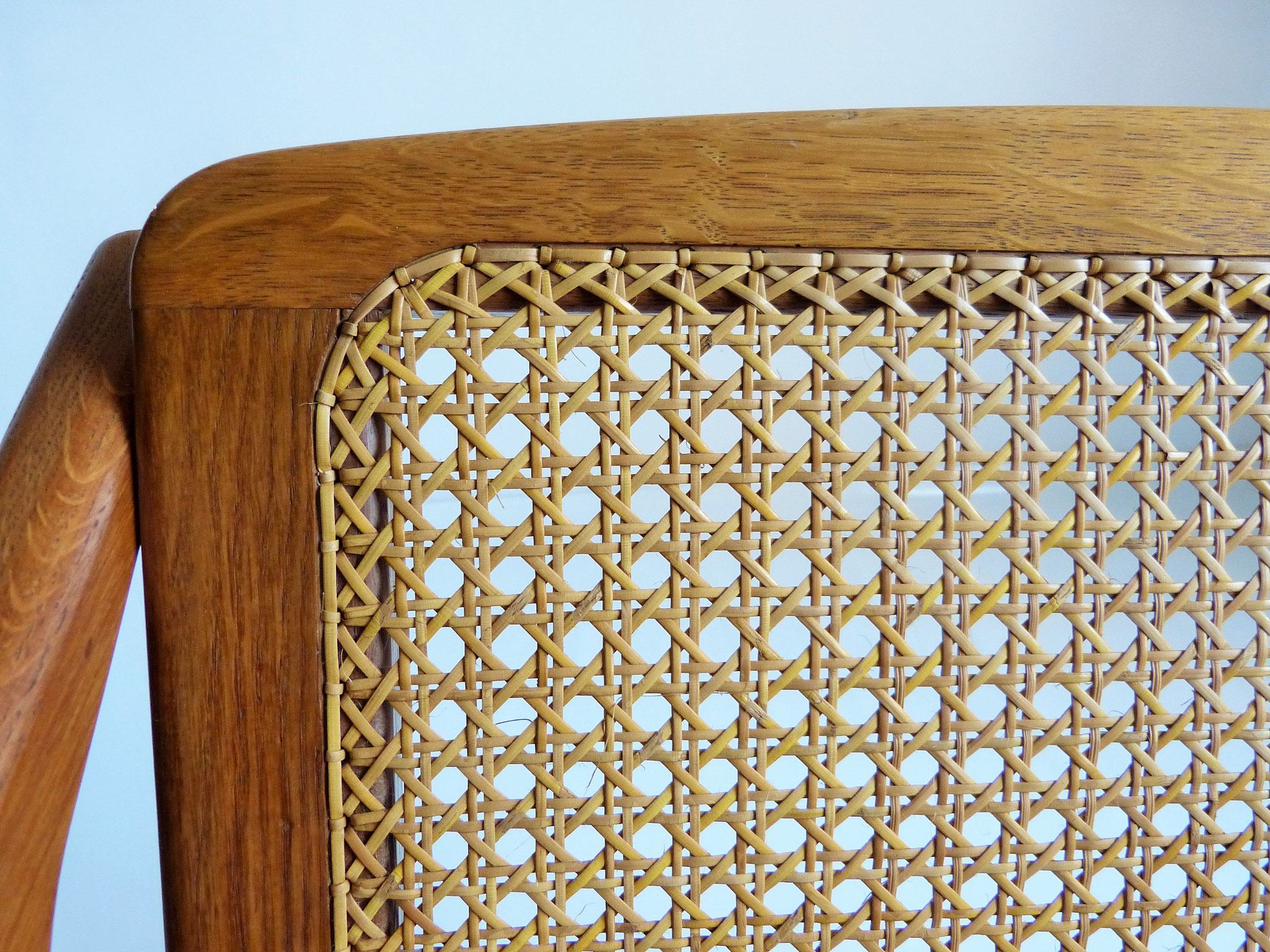 Traditional cane work border held in small holes.