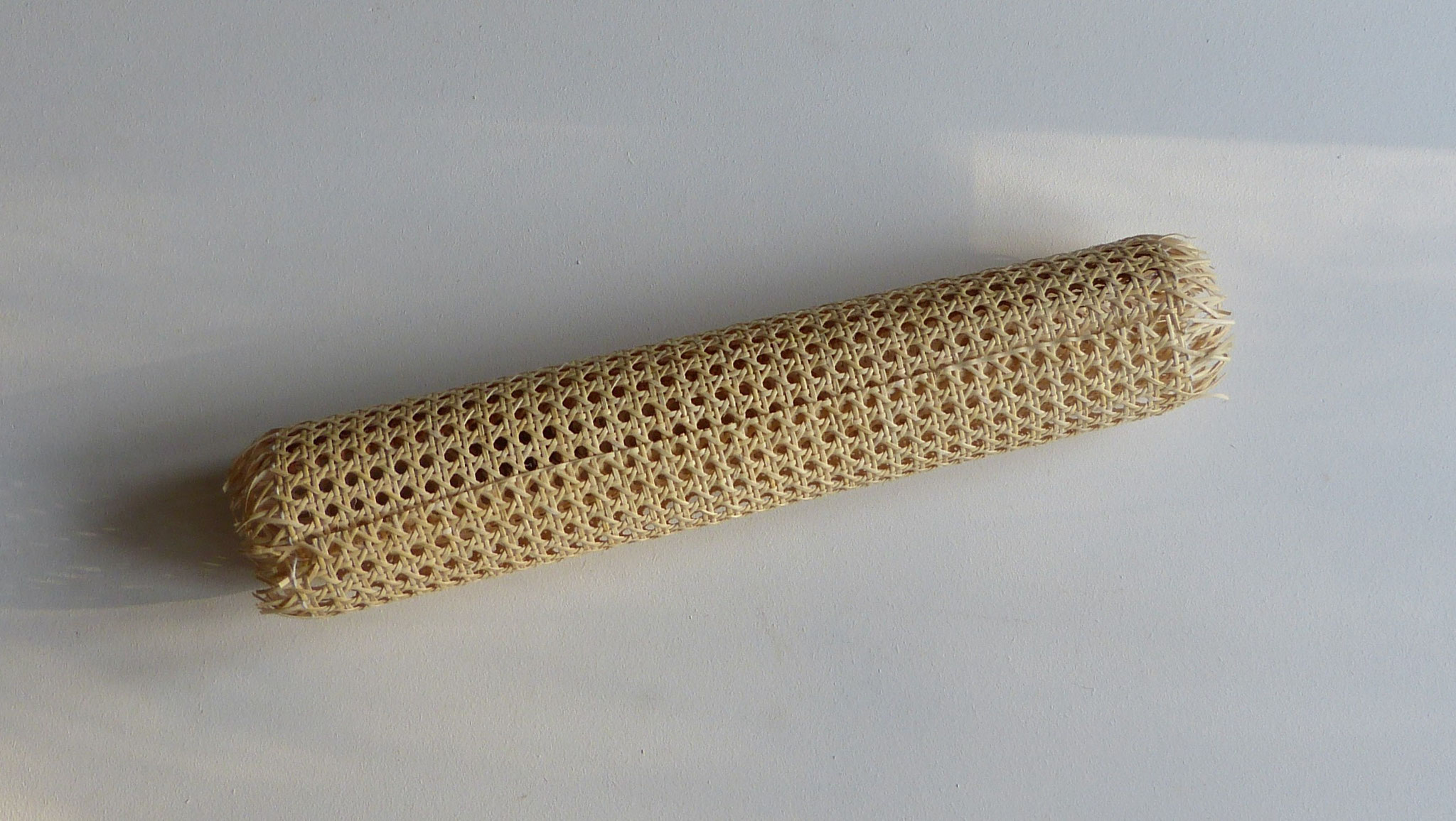 Roll of prewoven machine cane, pressed cane, strictly reserved for modern seats.