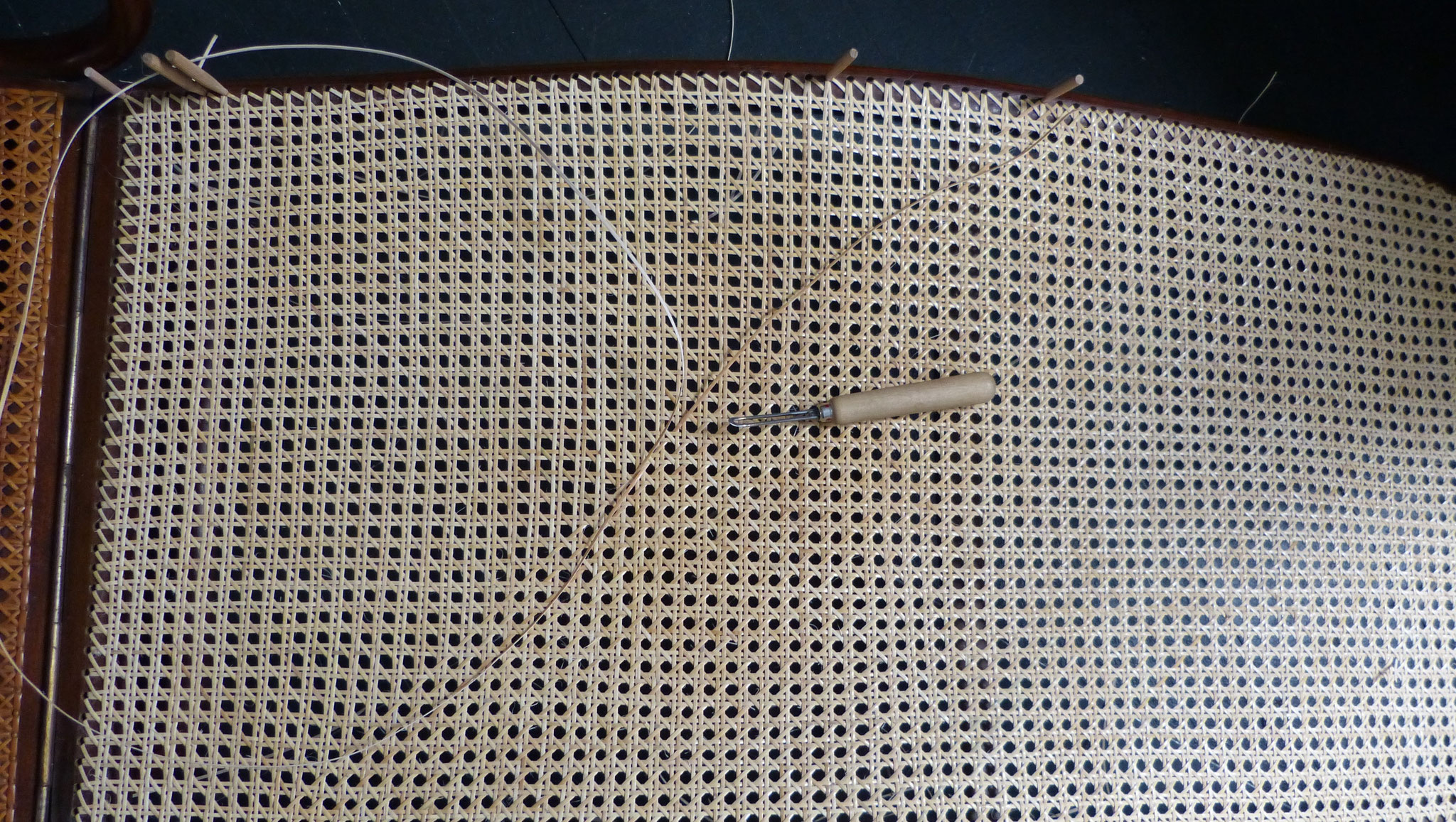 Long strand of cane for a handmade work.