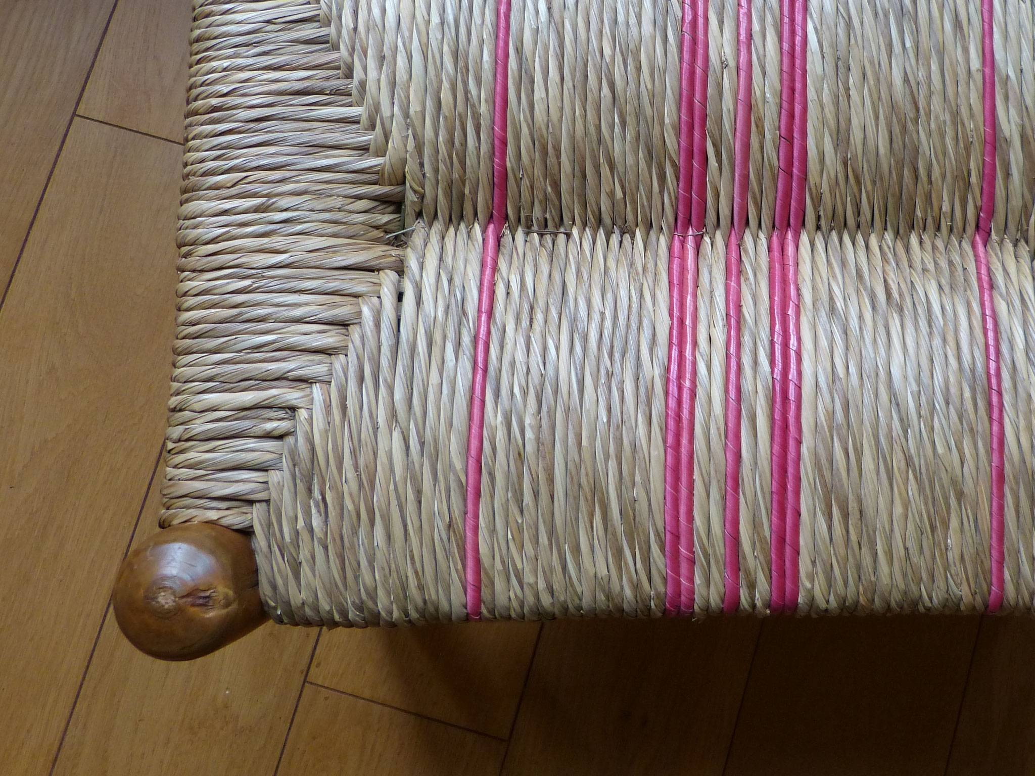 Mixed straw bottom, pink rye on a natural sedge bottom.