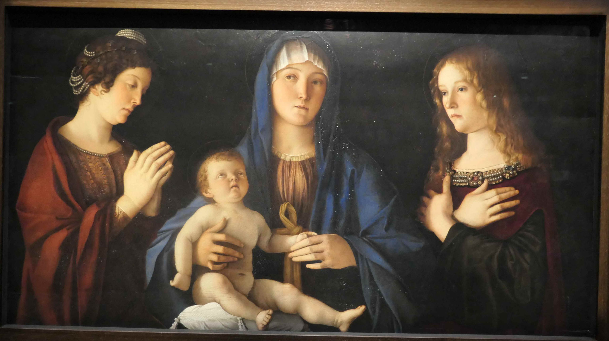 Giovanni Bellini, Maria mit dem Kind und den Heiligen Katharina und Maria Magdalena, um 1490 