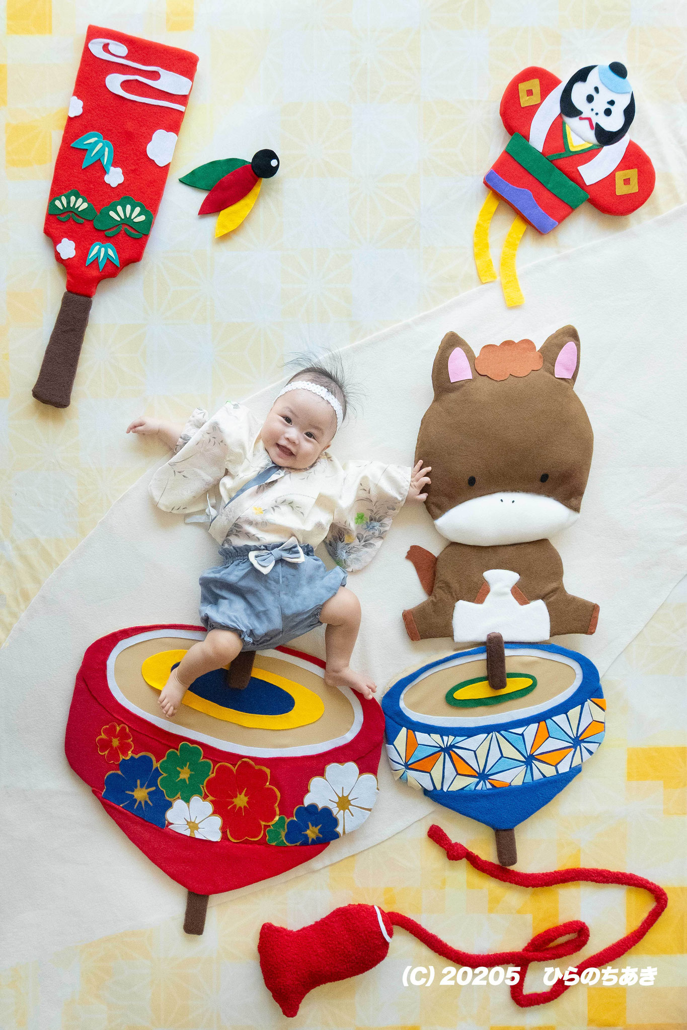 <div style=" font-size:10px; font-weight:bold;">おひるねアート<br />12/20 お正月はコマに乗って</div>