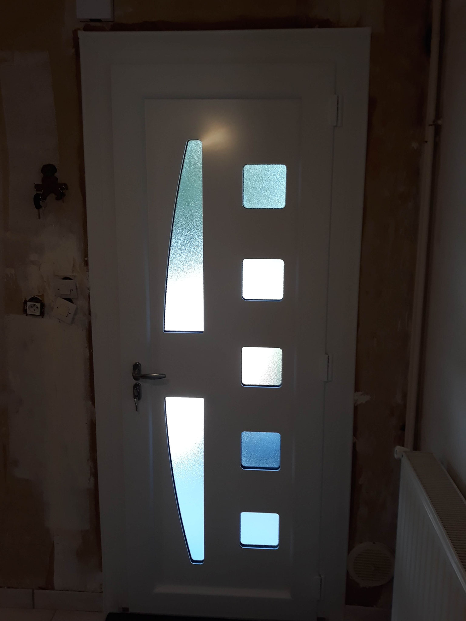 Porte d’entrée PVC blanc - vue intérieure.