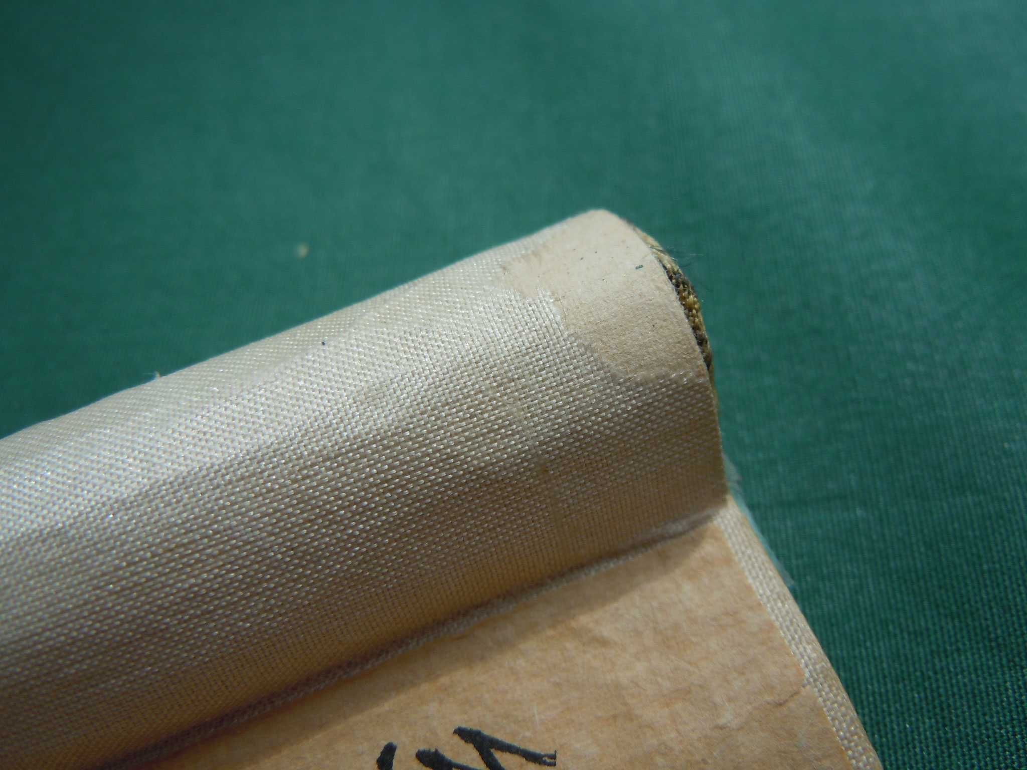Silk coating rubbed off,...