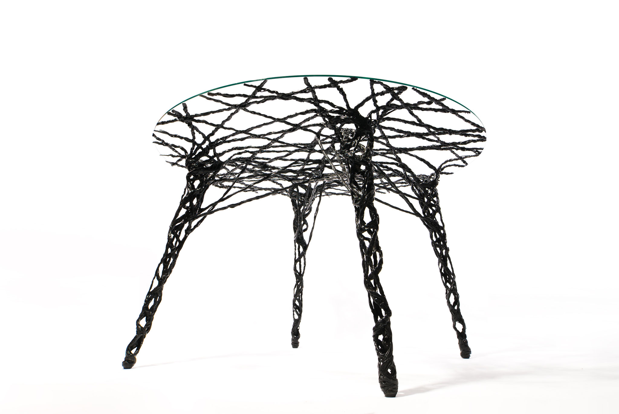 Constructive expressionism table, made out of carbon fiber and epoxy resin, H: 75 cm, W: 125cm, L: 125cm