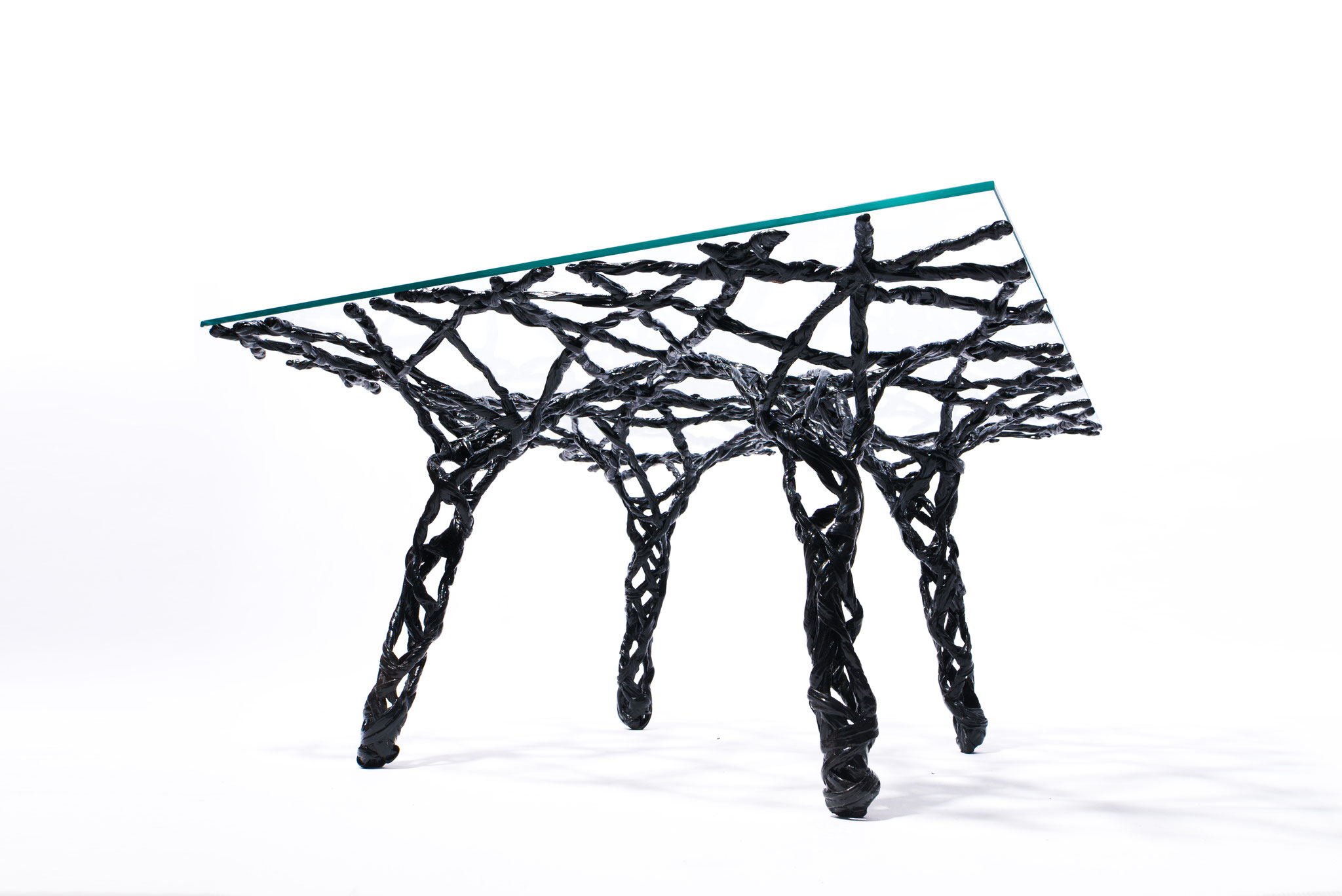 Constructive expressionism side table, made out of carbon fiber and epoxy resin, H: 40cm, W: 81cm, L: 81cm