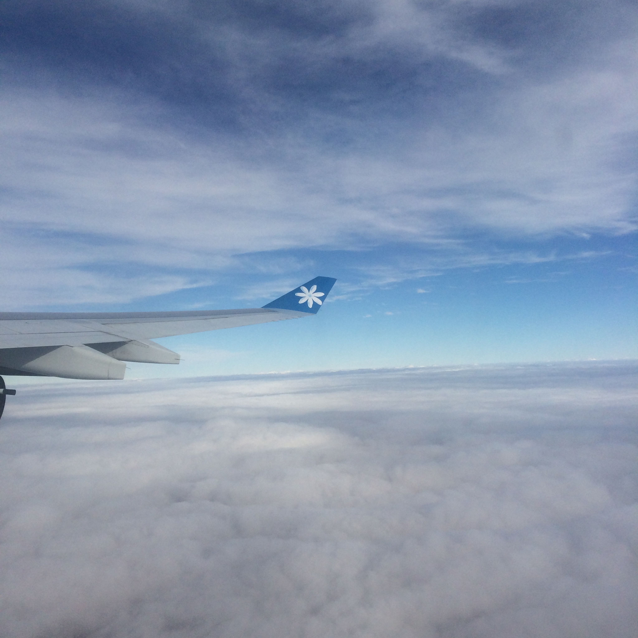 Flying Air Tahiti over cotton candy 