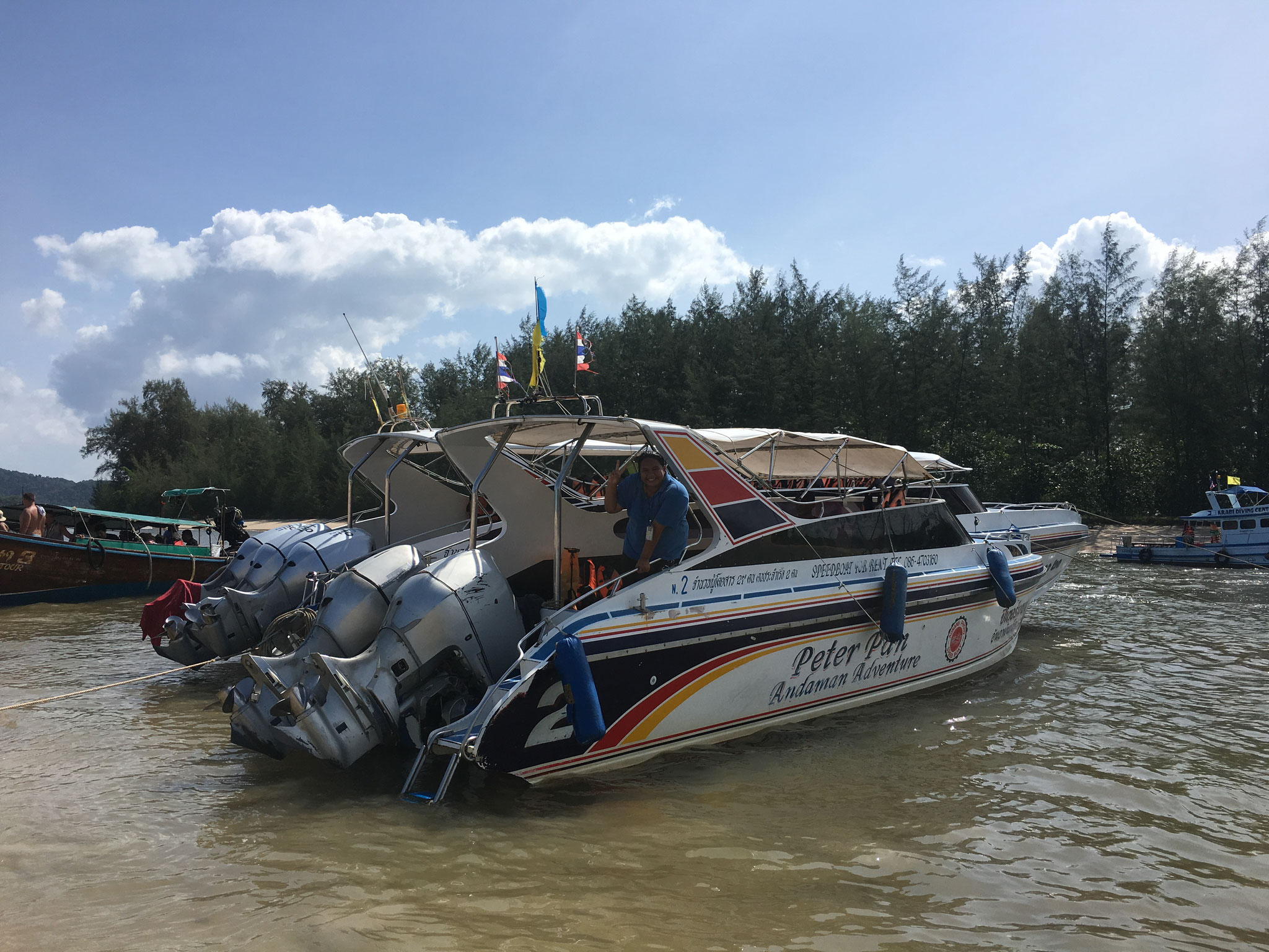 Our boat and lovely tourguide 