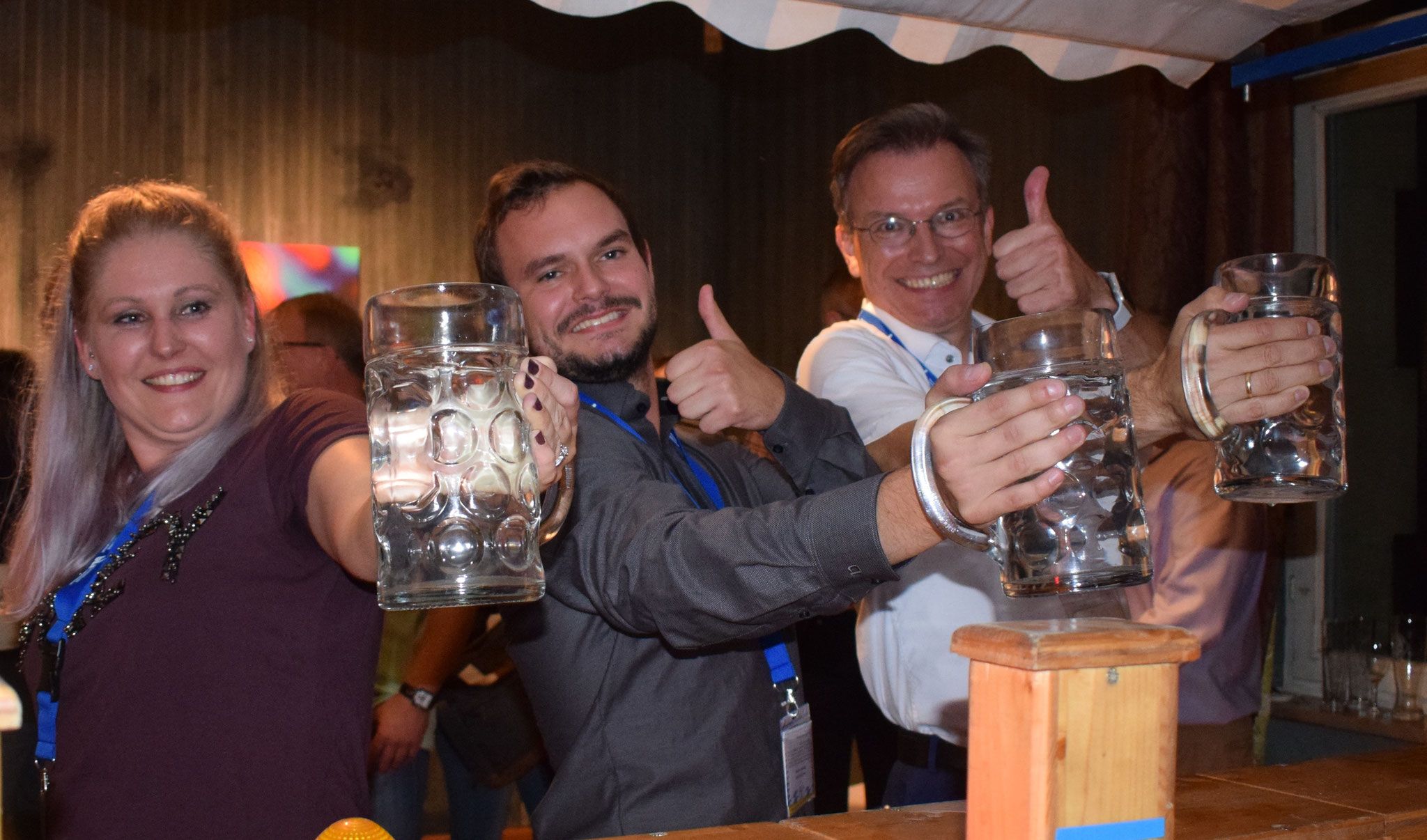 LANE participants playing beer stein holding at the Casual Reception & Bavarian Evening