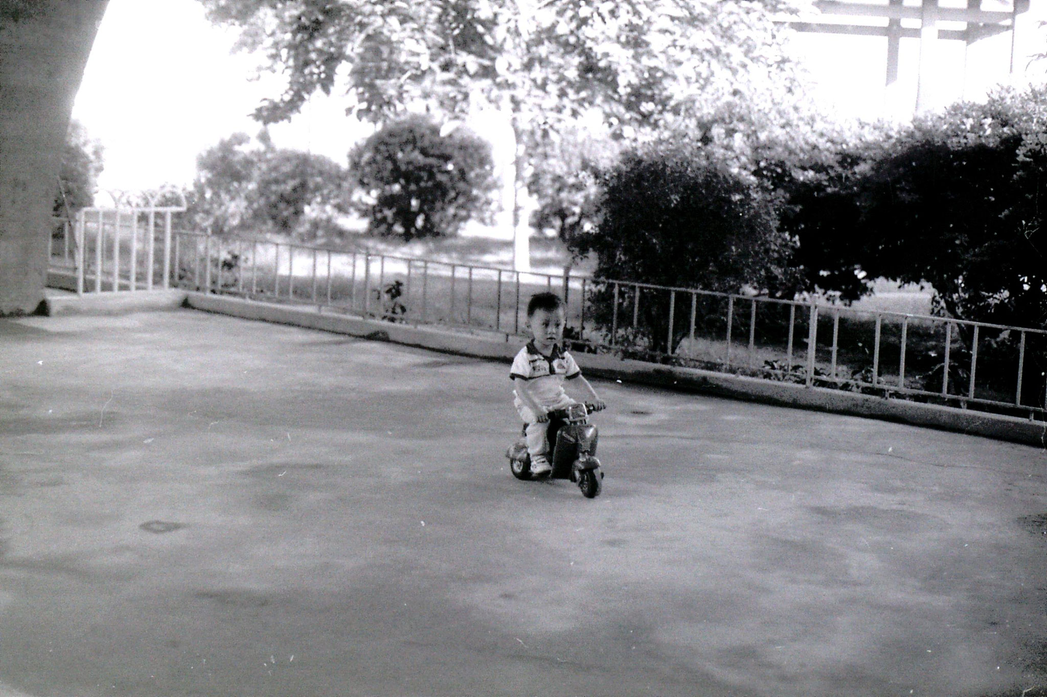 17/5/1989: 22: Guangzhou boy on miniature motor bike