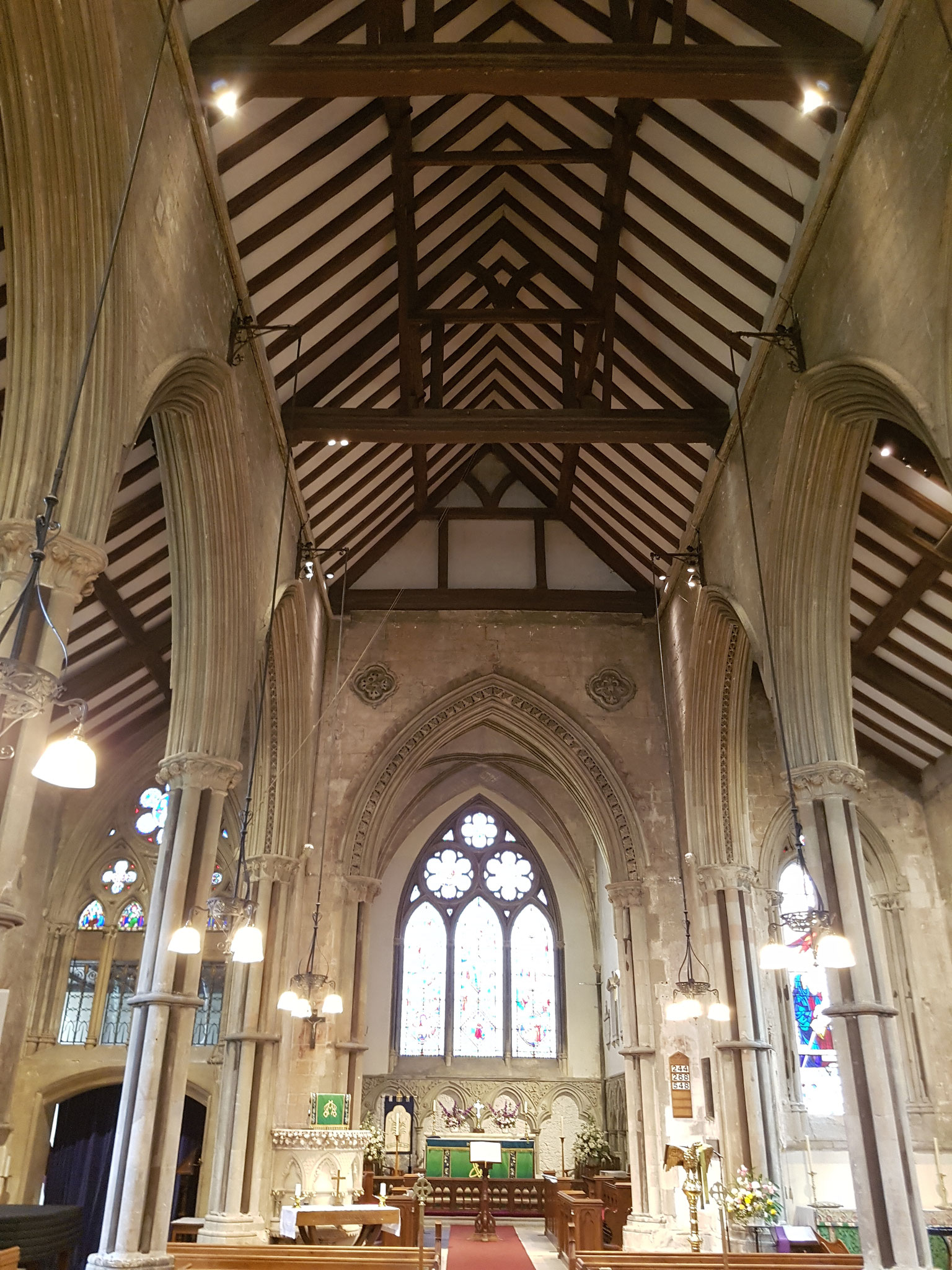 Early Gothic nave. Piers have alternating shafts of plain stone and Purbeck marble.