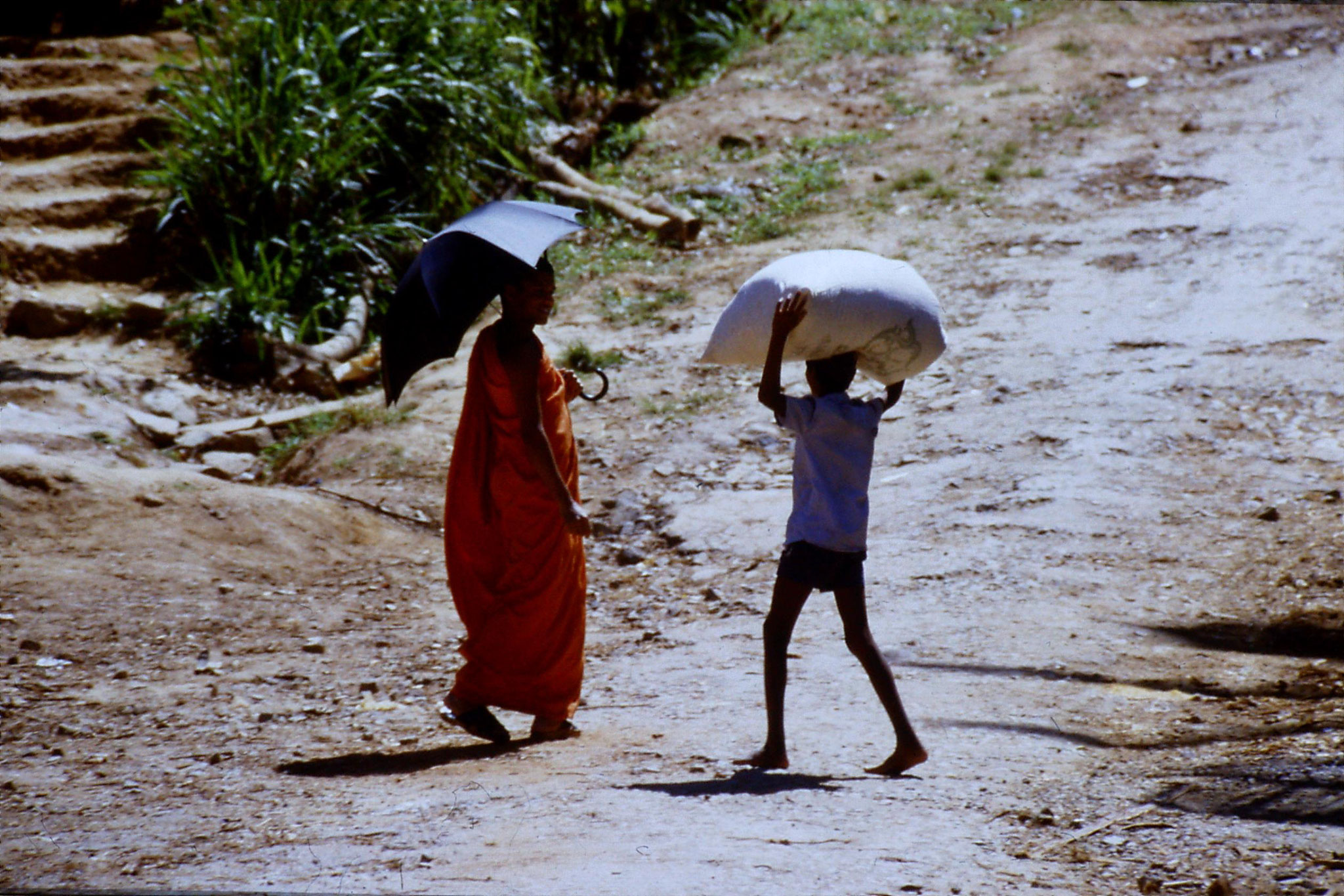 3/2/1989: 8: Buddhist monk with umbrella