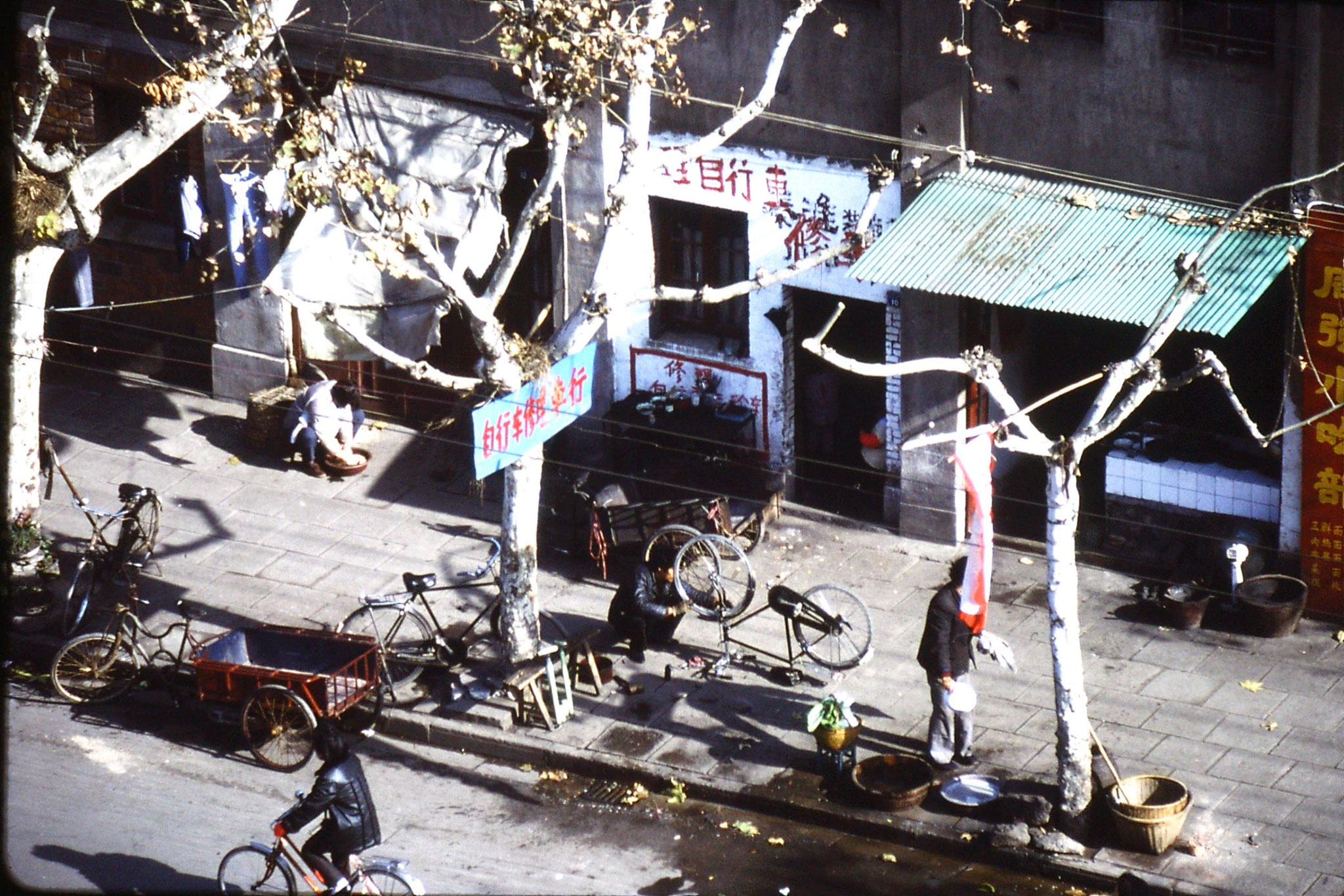 11/12/1988: 24: Nanjing bike repairer