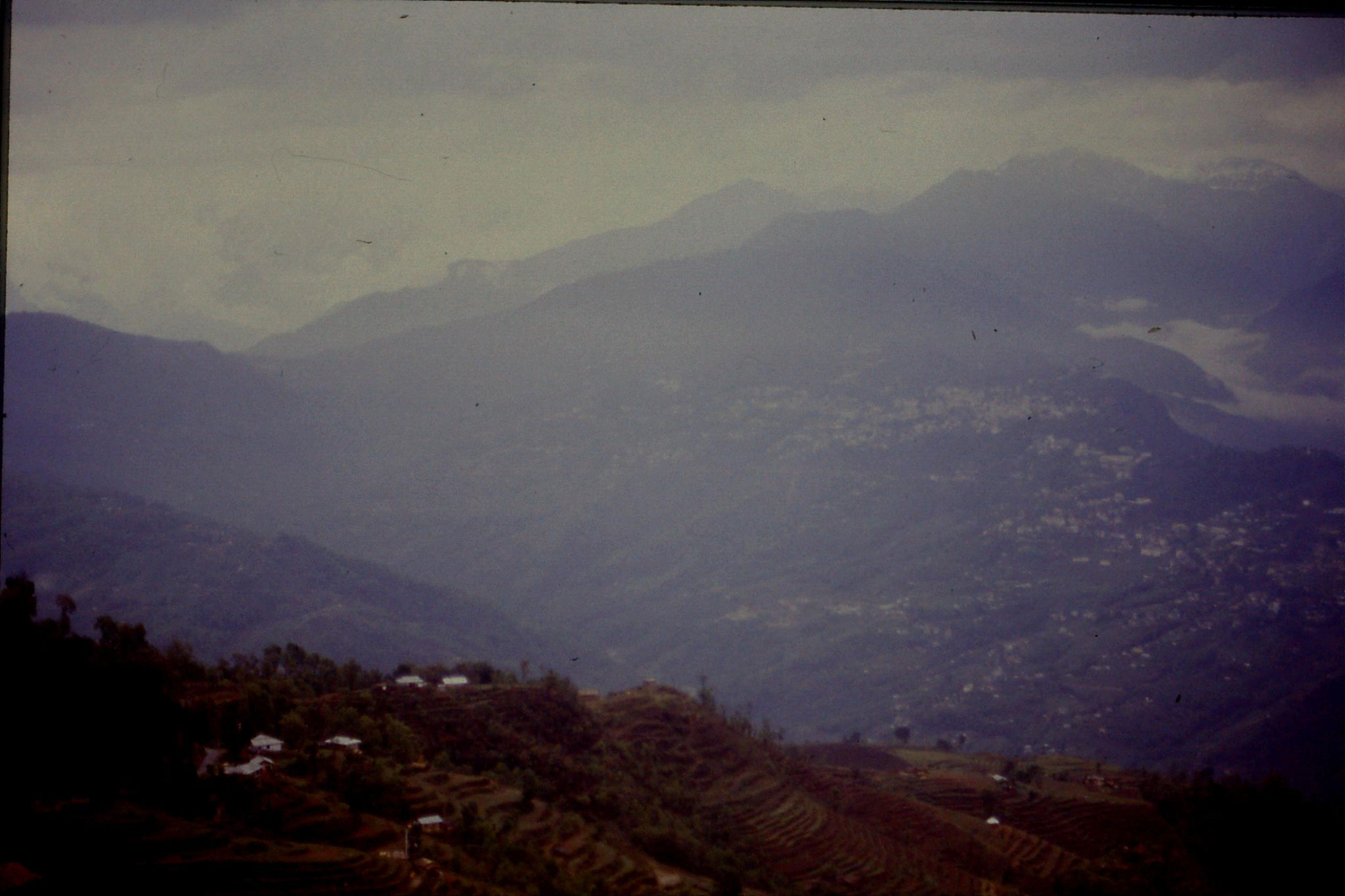 115/10: 23/4/1990 Rumtek - view of Gangtok and terrain