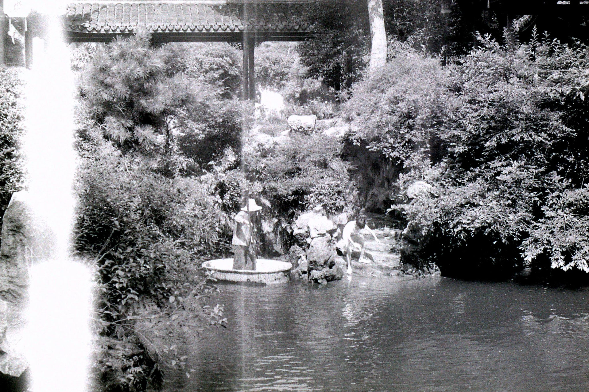 15/7/1989: 1: Yellow Dragon Spring Cave, old man, boat and boy