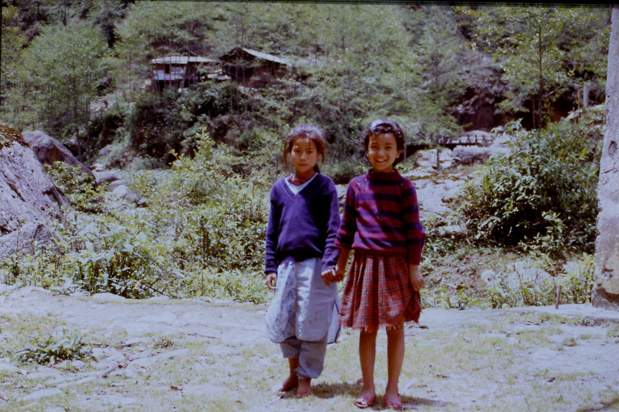 8/5/1990: 34: Sikhola, two hours below Rimbik at bridge - (Yanki on tight, Dixi on left)