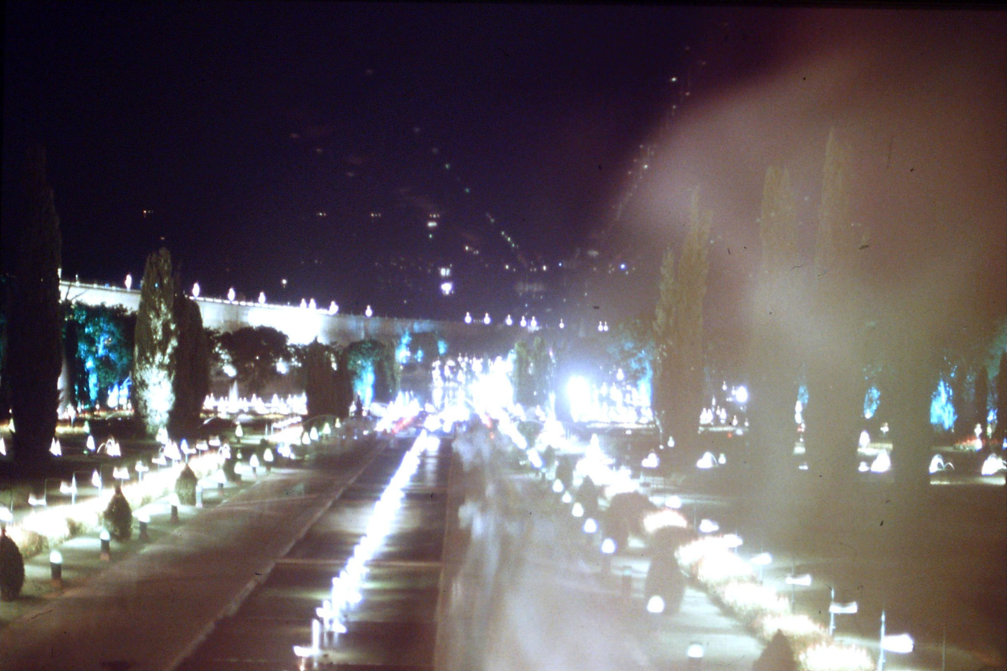 108/11: 12/3/1990 Brindavan Garden at night (30 secs) people passing