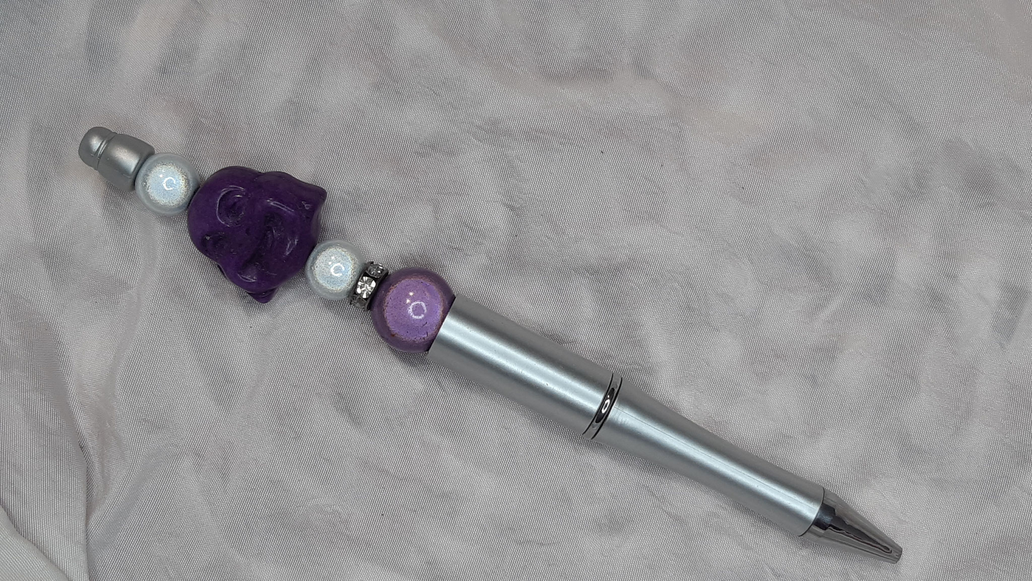 modèle 20 : stylo argenté Bouddha violet