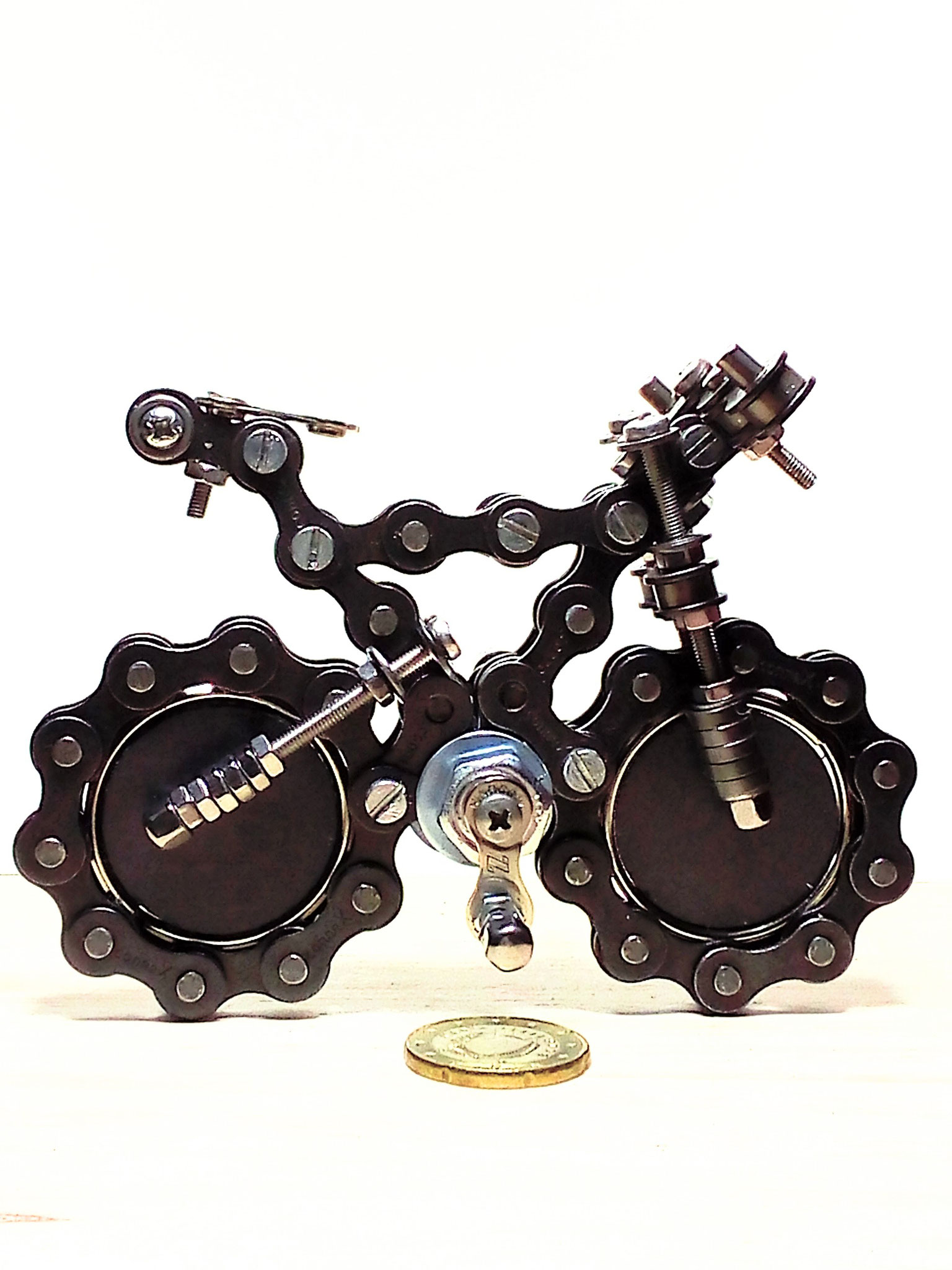 Unique handmade Bicycle chain art work - swisstrailbell® meets bicycle ...