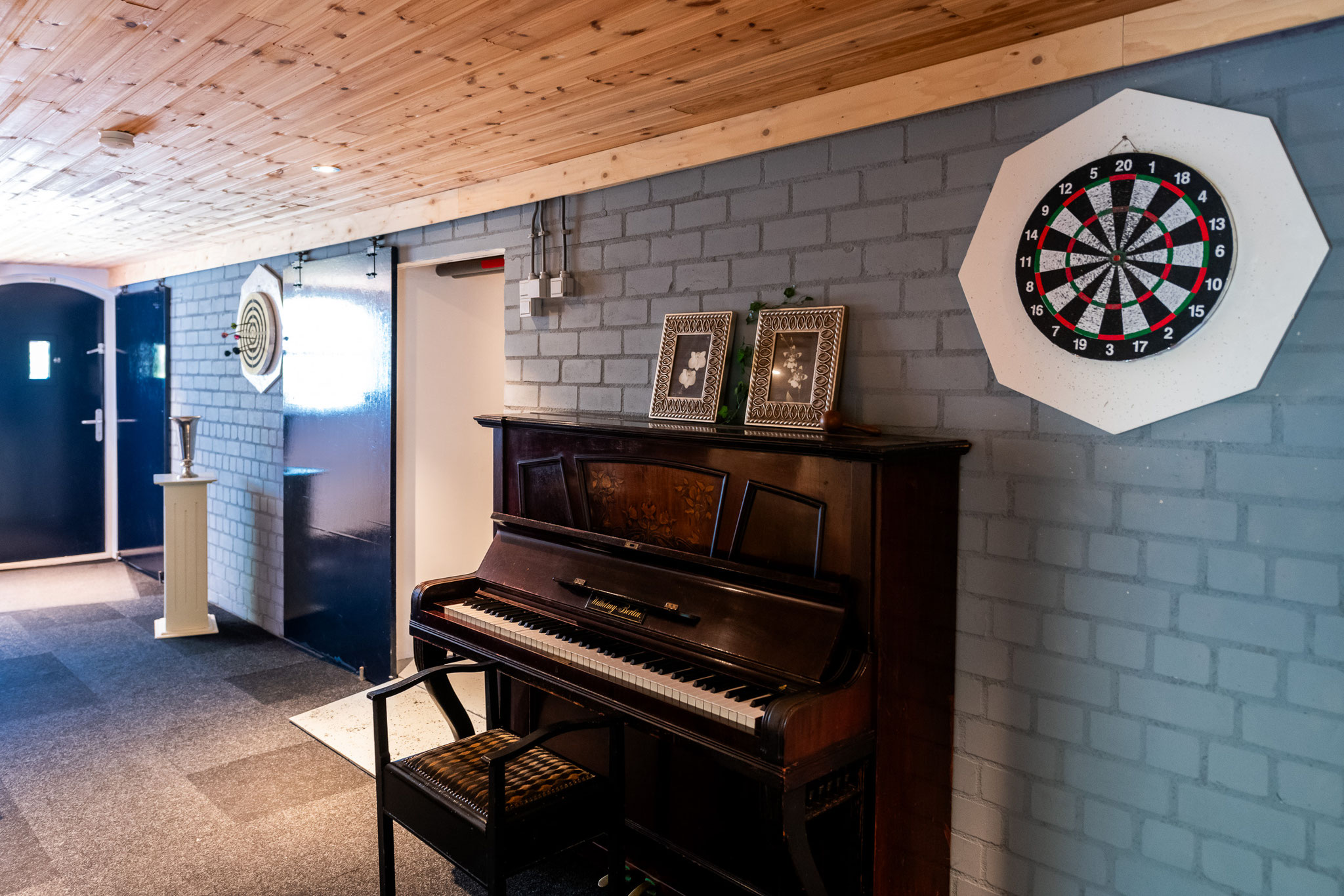 Darten en pianospelen