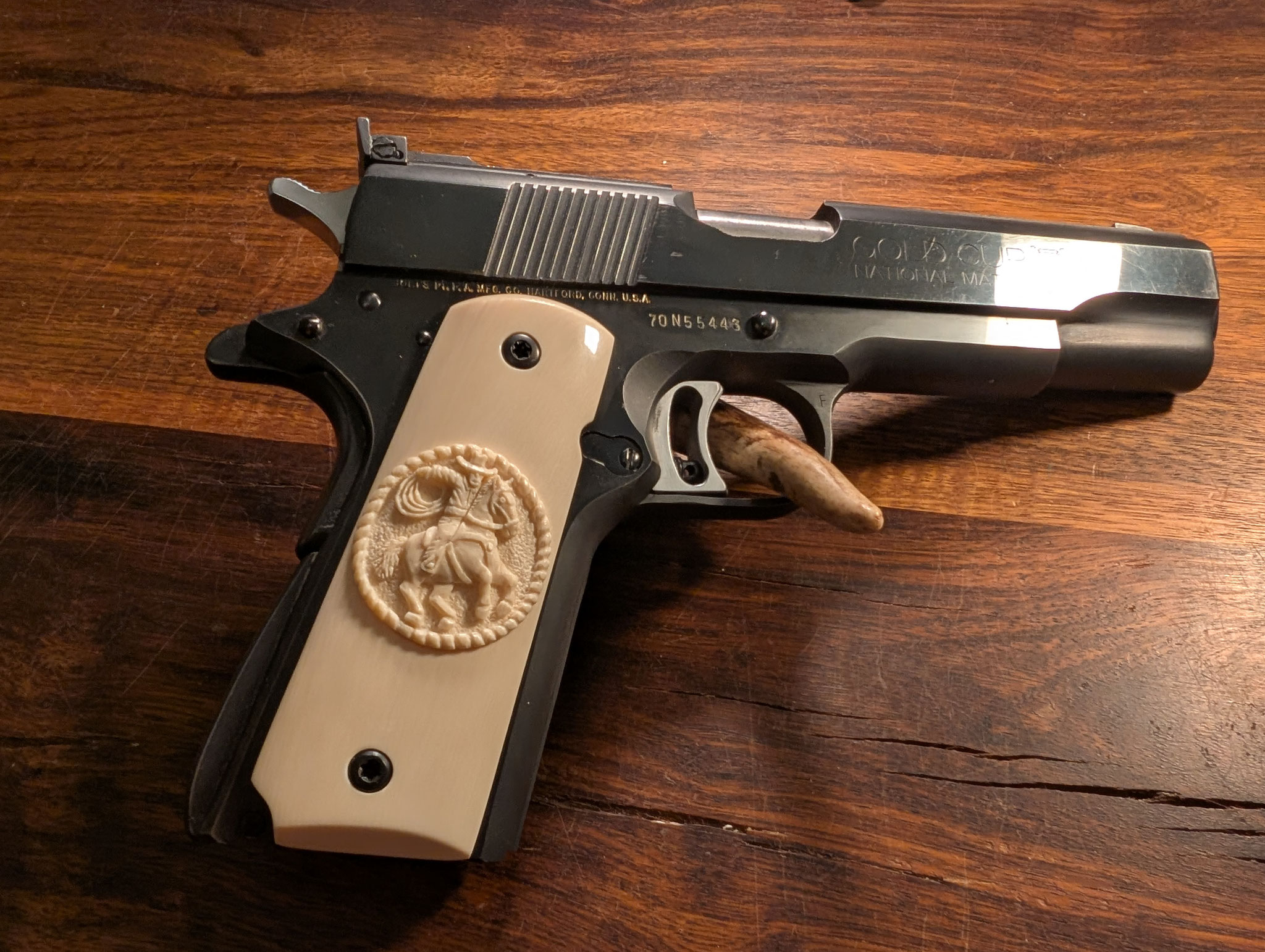Colt 1911 with carved grips