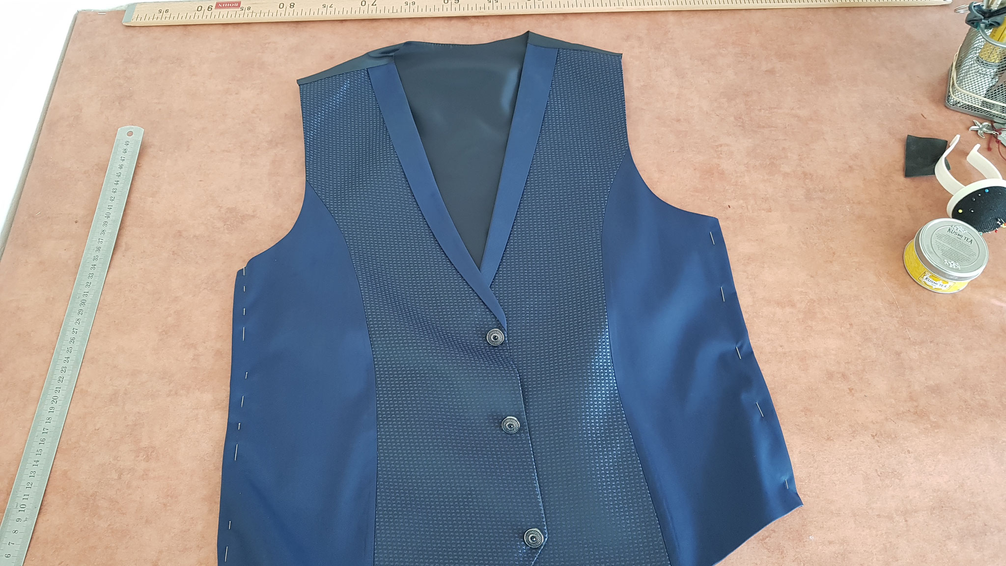 reprise des côtés de gilet homme