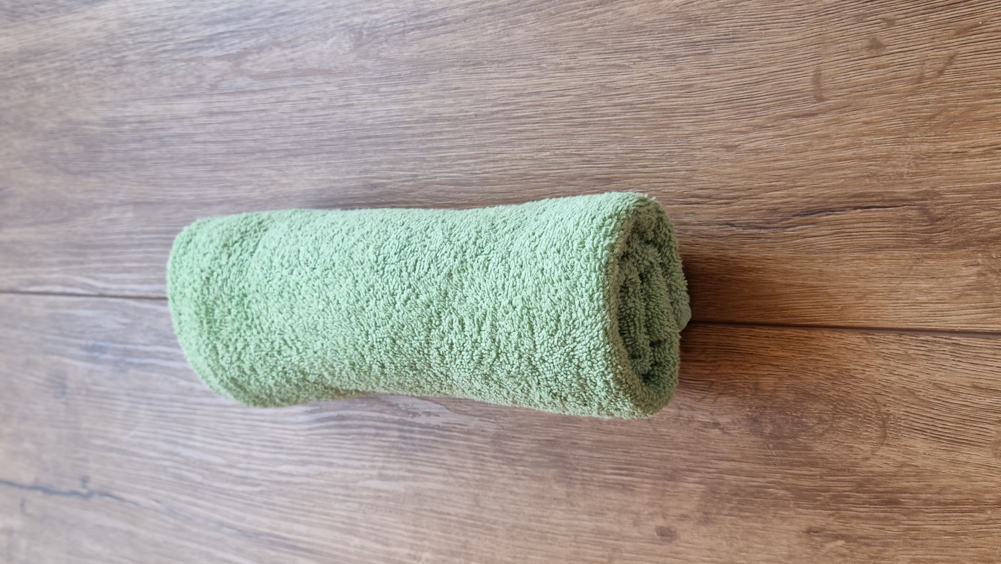 von der kurzen Seite aus streng einrollen