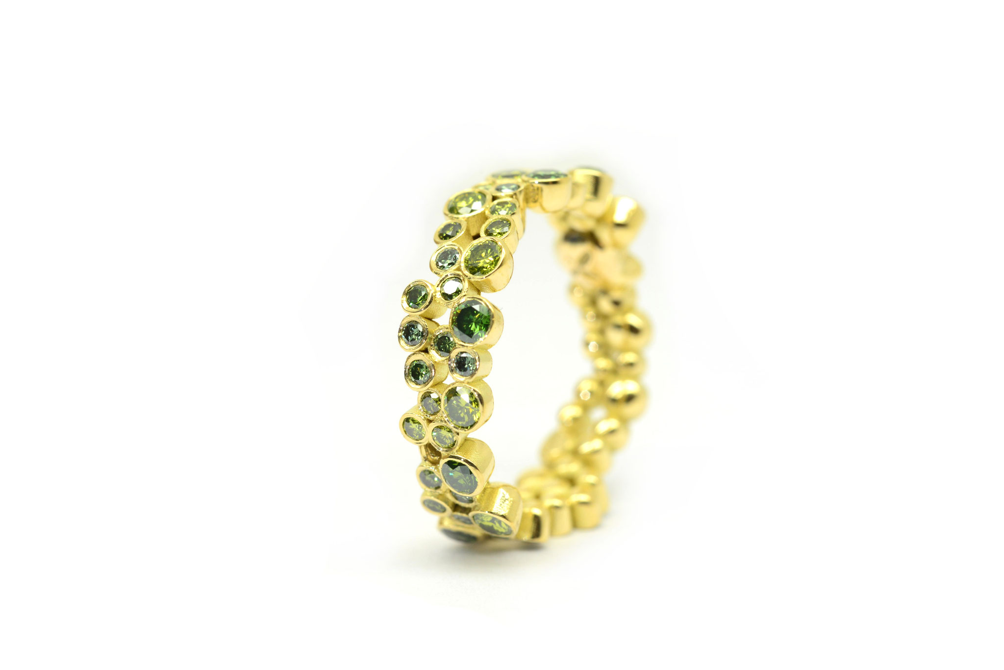 Grüne Brillanten. 750/ooo Gold. 