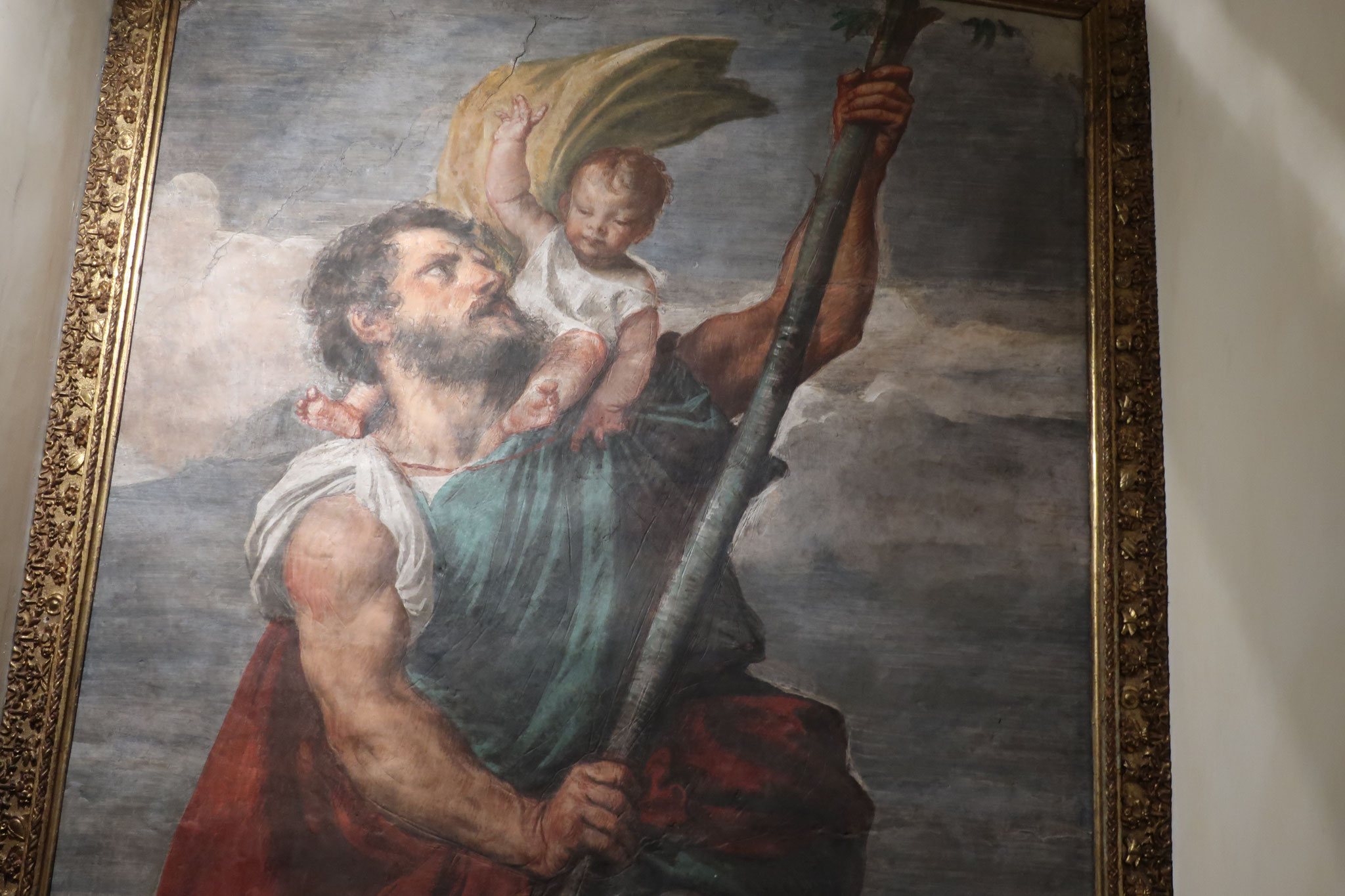 The fresco painting by Titian, "St. Christopher Crossing the Swollen River" 