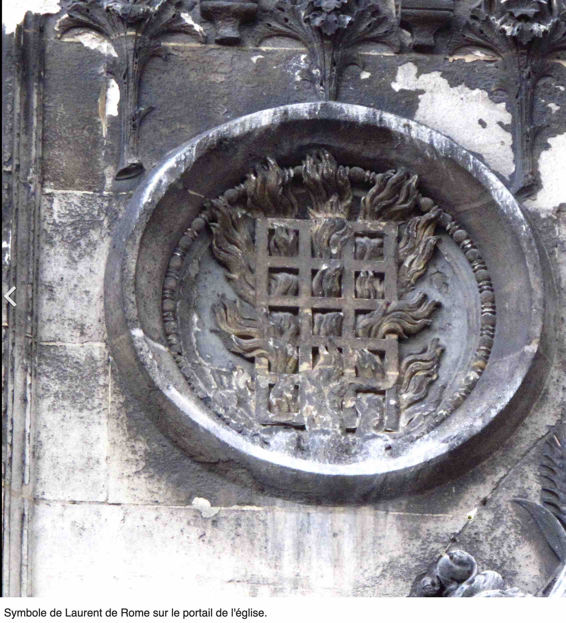 Grill du supplice de saint Laurent, sur la façade de l'église (google)