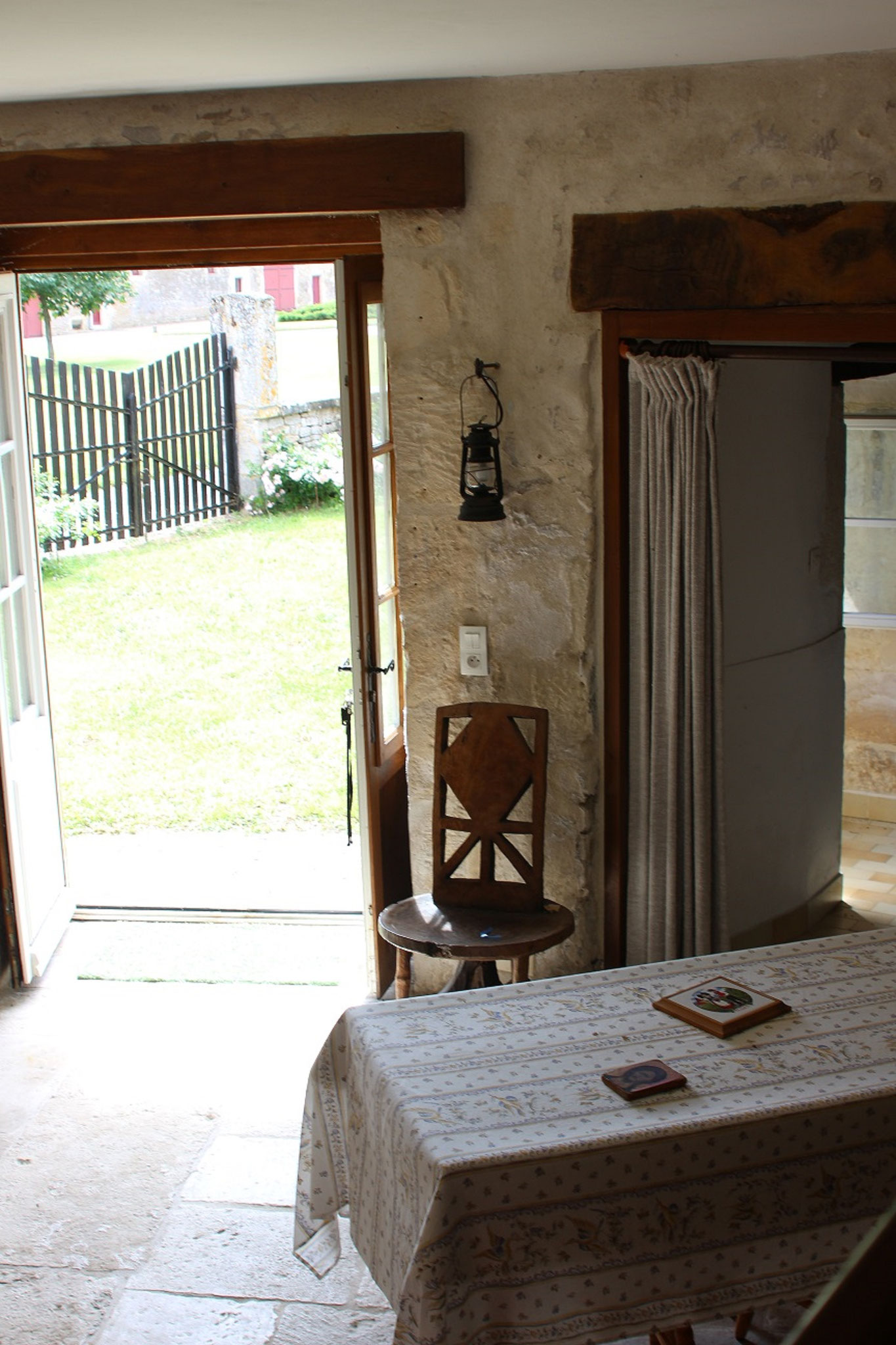 In the tower, the living room, dining area on the ground floor, overlooking the garden