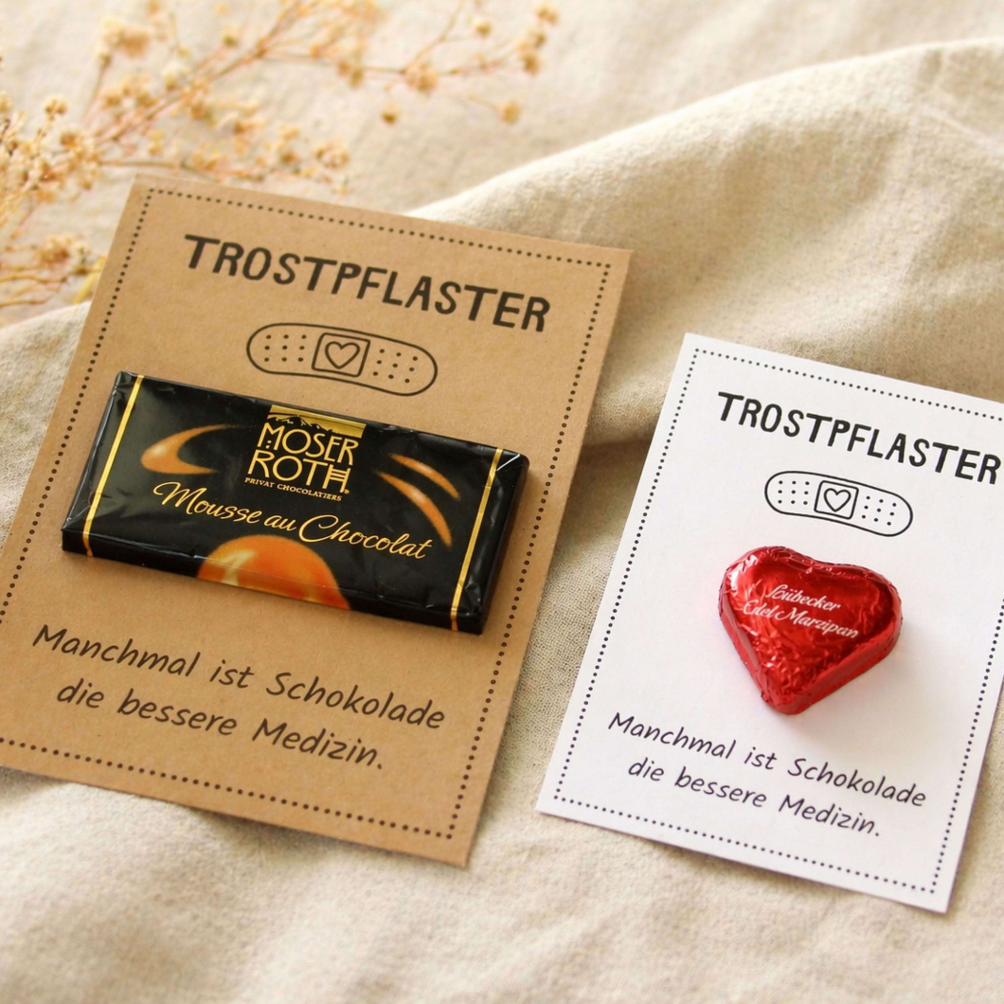 Zwei Trostpflaster‑Karten mit Schokolade als liebevolles Aufmunterungsgeschenk, DIY‑Vorlage zum Ausdrucken.
