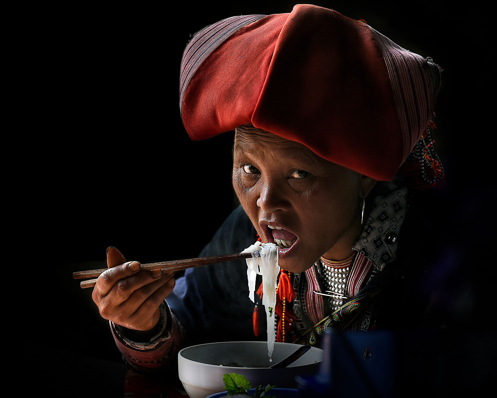 Irene Perovich (Italy) - Dzao woman eating