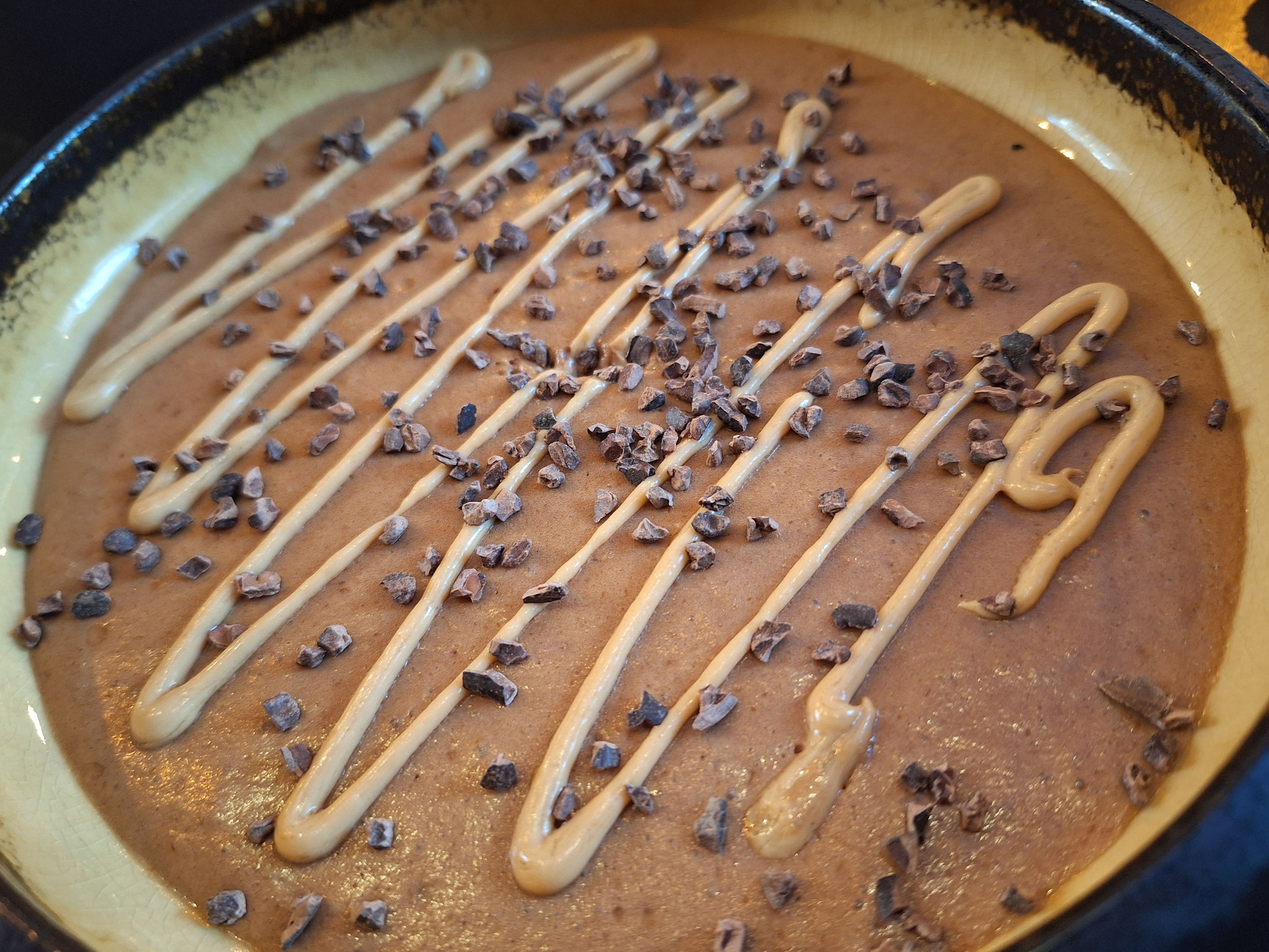 Mousse au chocolat au lait, praliné cacahuètes, grué de cacao
