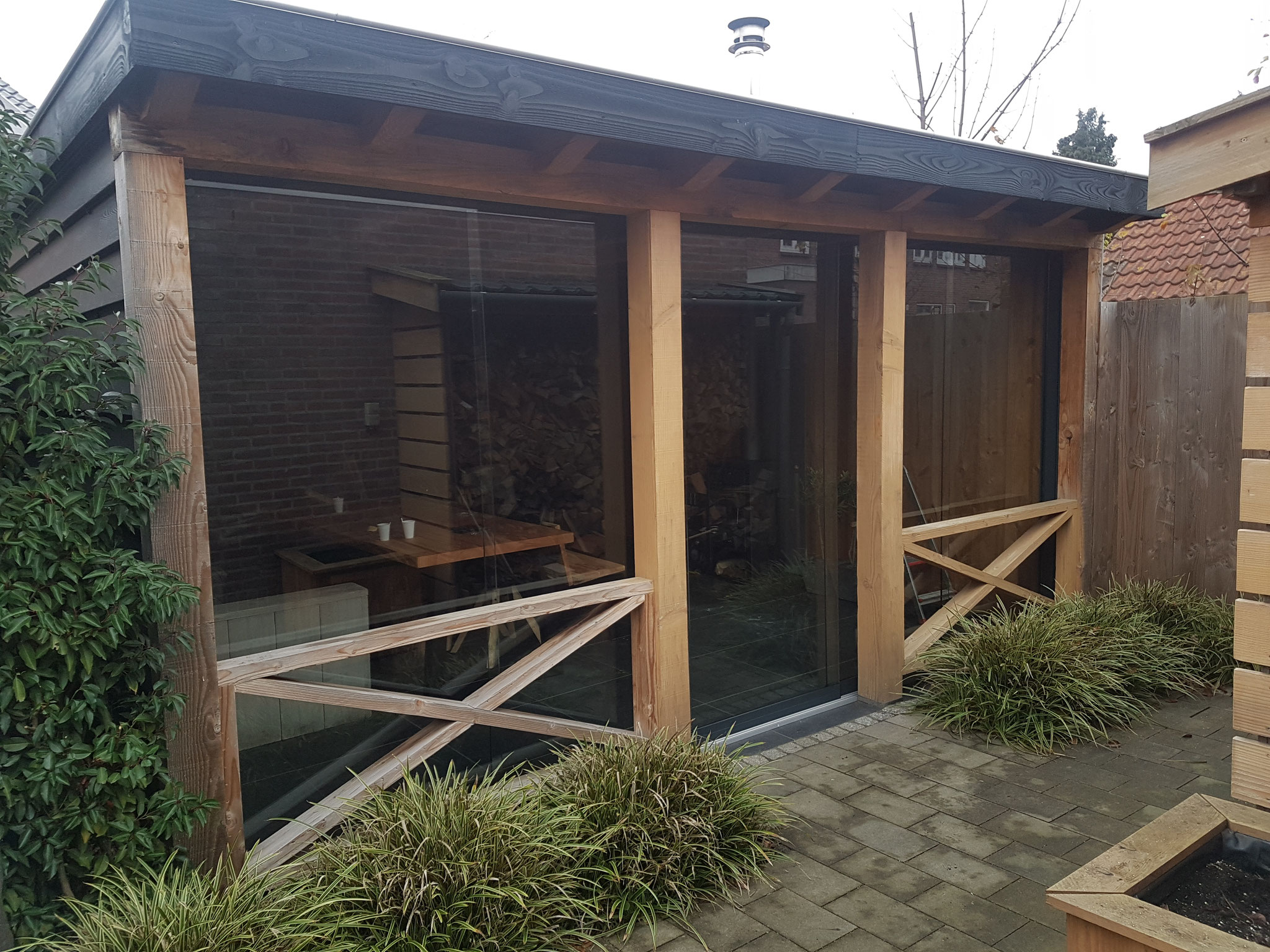 Glazen schuifwand in bestaande veranda