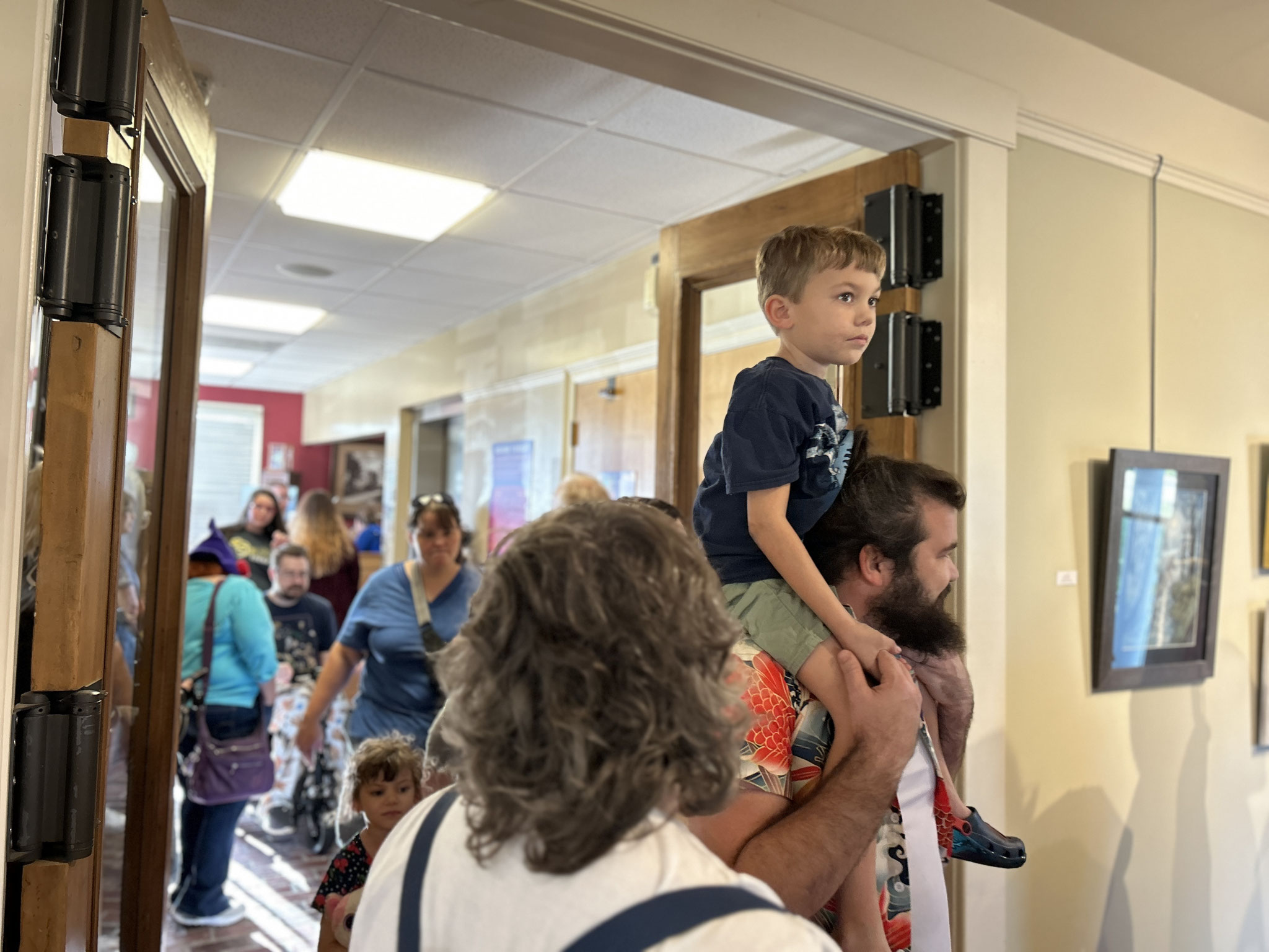 Guests pass through the downstairs hallway