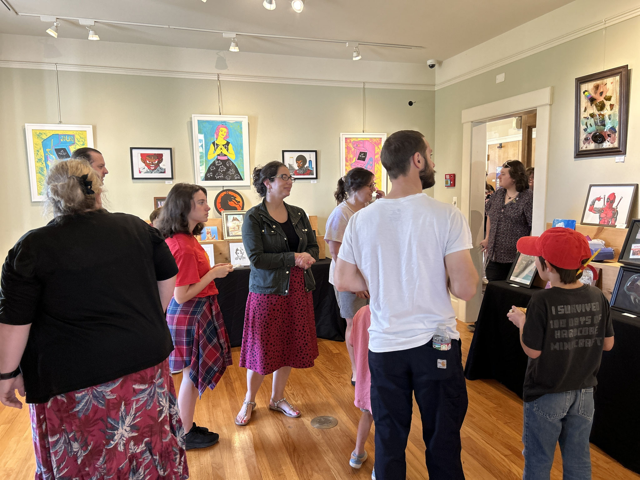 Guests view the artwork on opening night