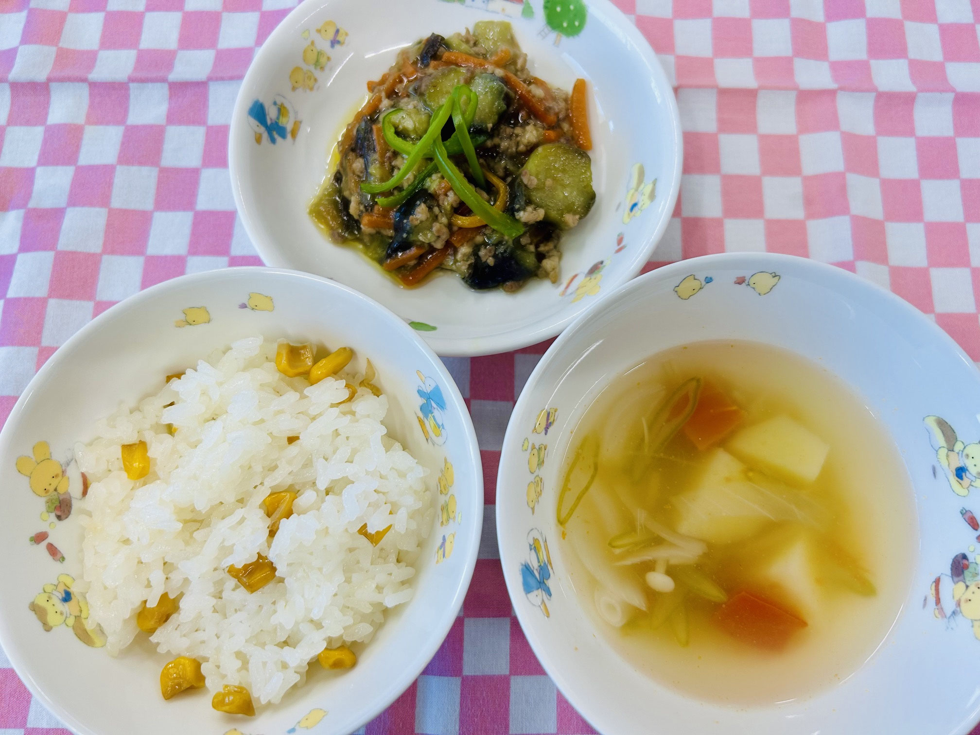 7/14 焼きもろこし飯　トマトスープ　なすの肉みそ炒め